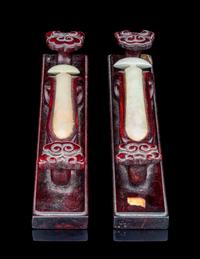 A Pair of Jade Inset Hardwood Paper Weights