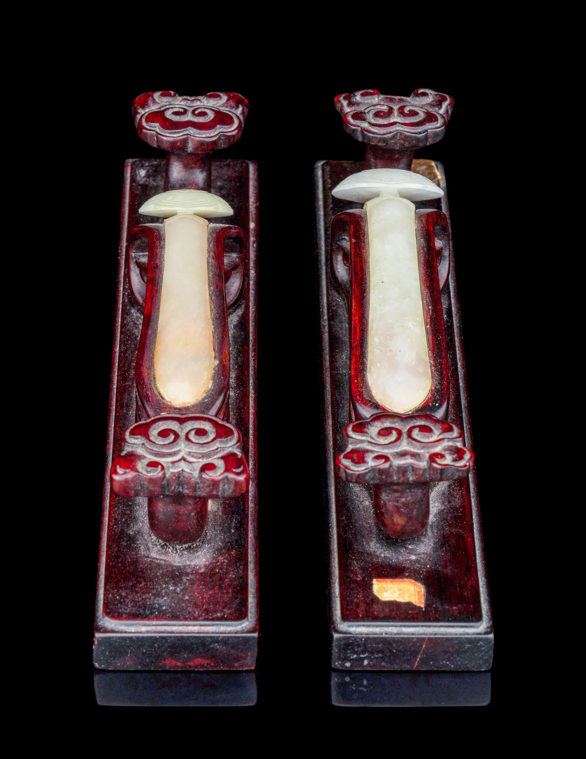 A Pair of Jade Inset Hardwood Paper Weights