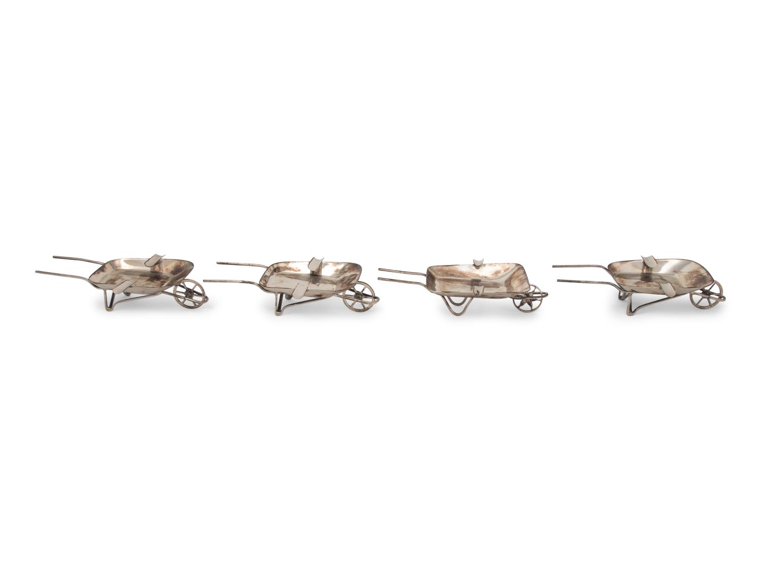 An Assembled Set of Four Mexican Silver Wheelbarrow-Form Ash Trays