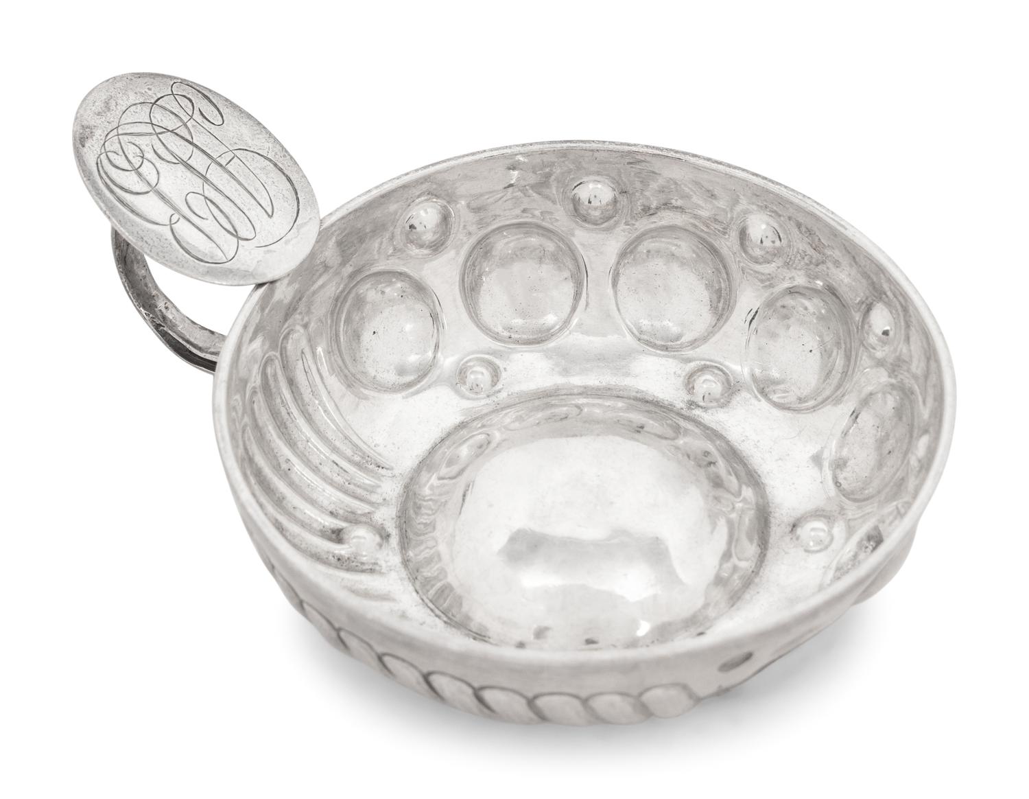 A Collection of Ten Silver-Plate Wine Tasters