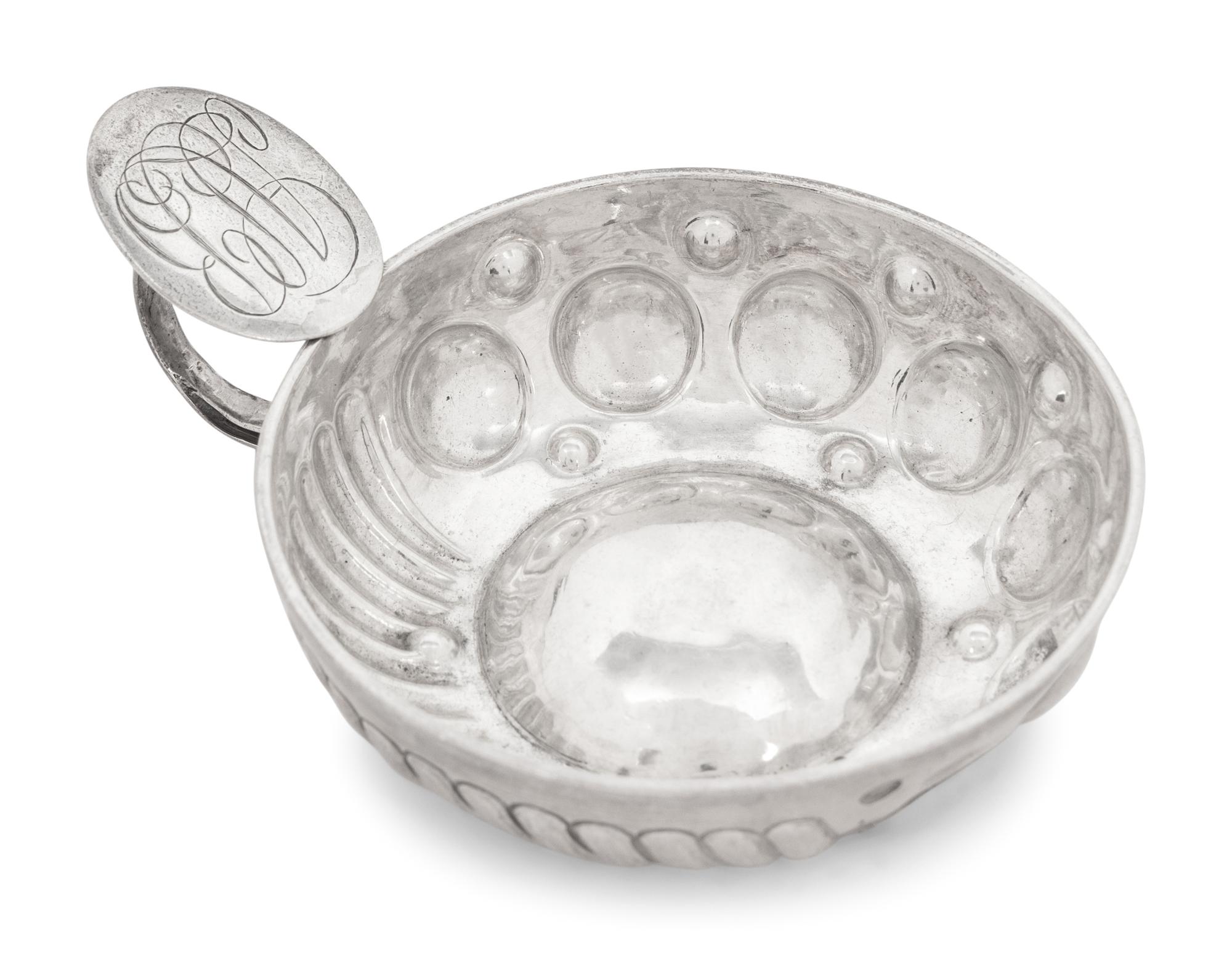 A Collection of Ten Silver-Plate Wine Tasters