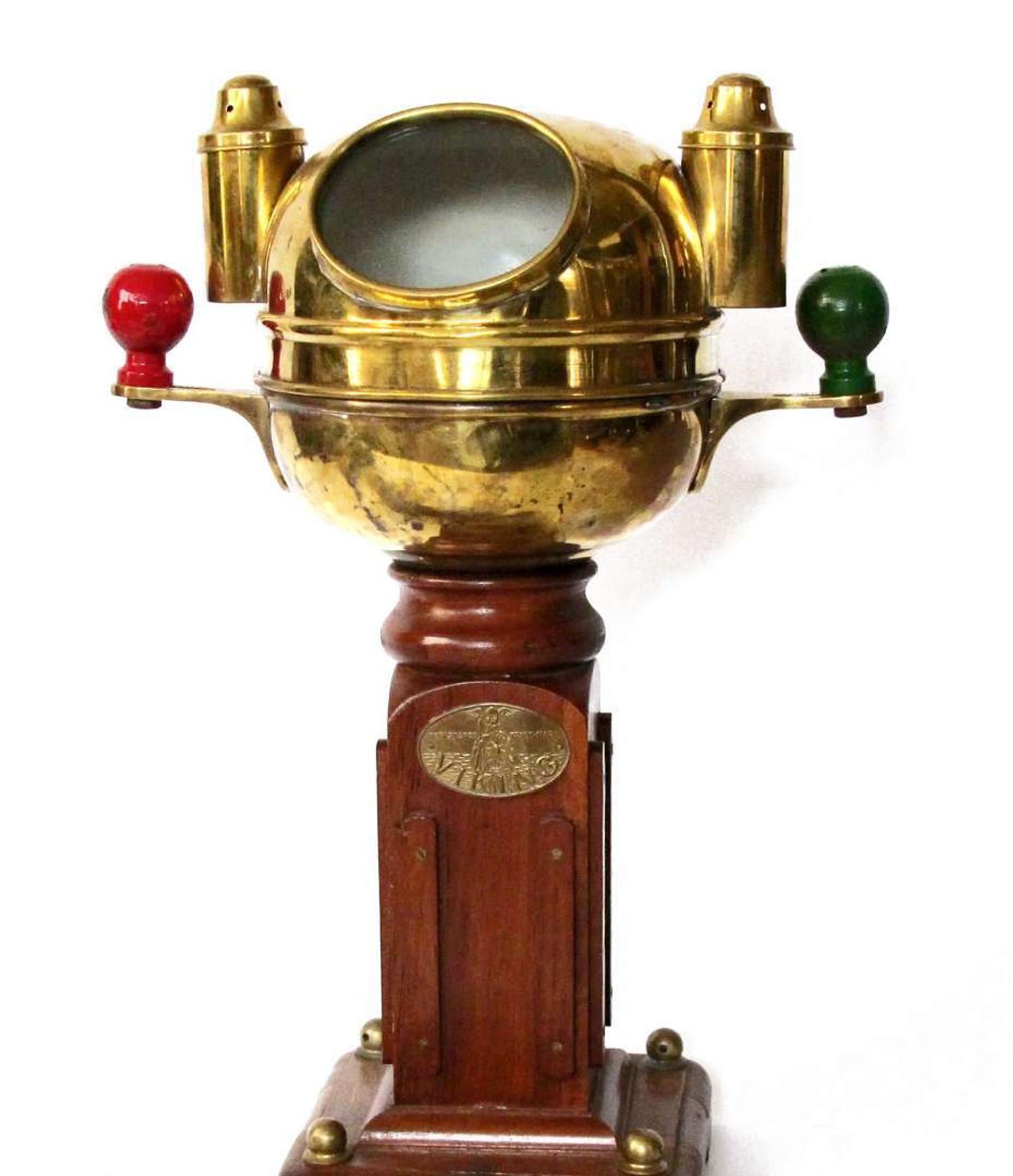Brass glass and wood binnacle "trademark viking"