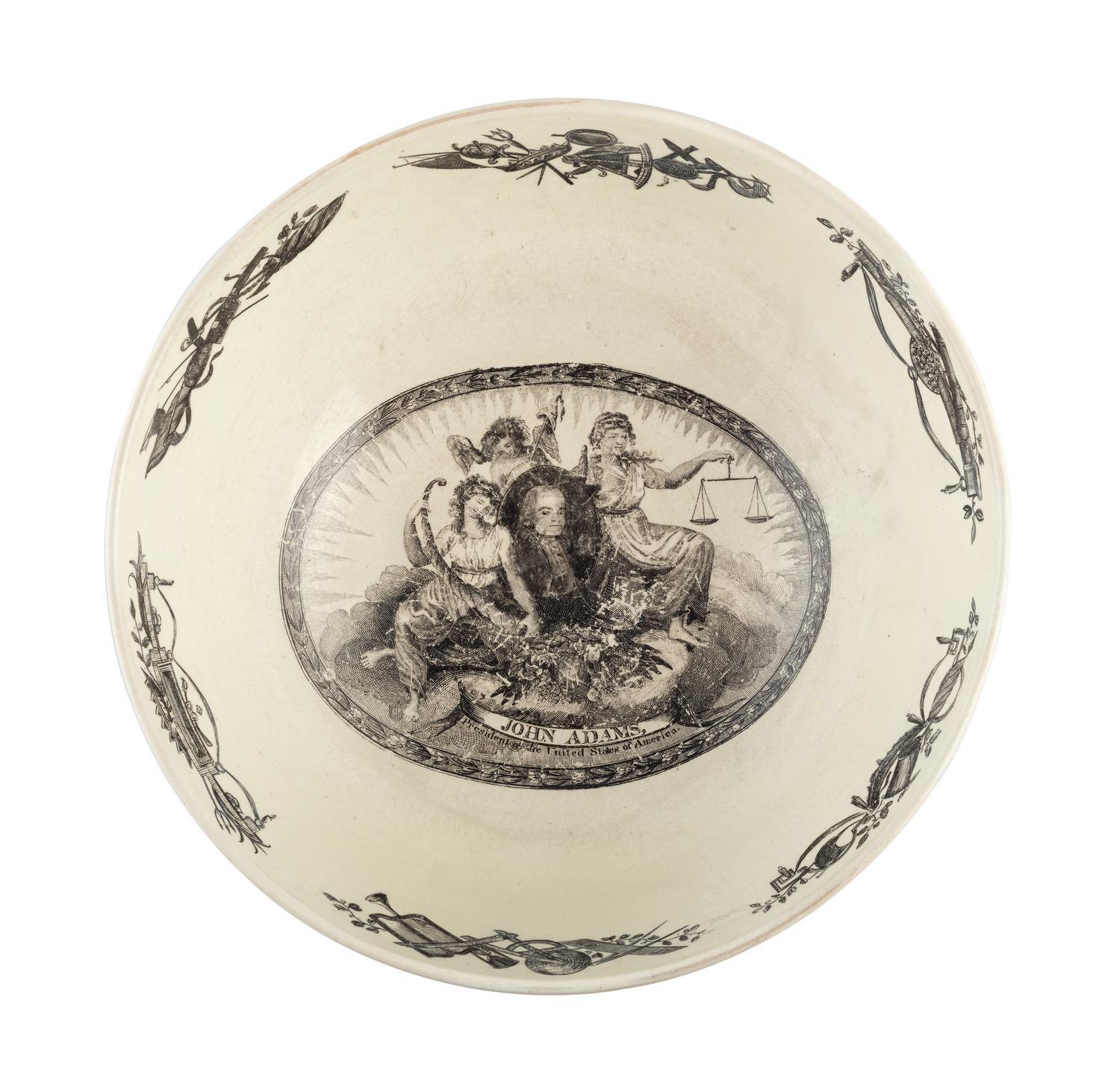 [ADAMS, John (1735-1826)]. Liverpool creamware punch bowl featuring portraits of John Adams as President, Benjamin Franklin, and George Washington. Late 18th/early 19th century.
