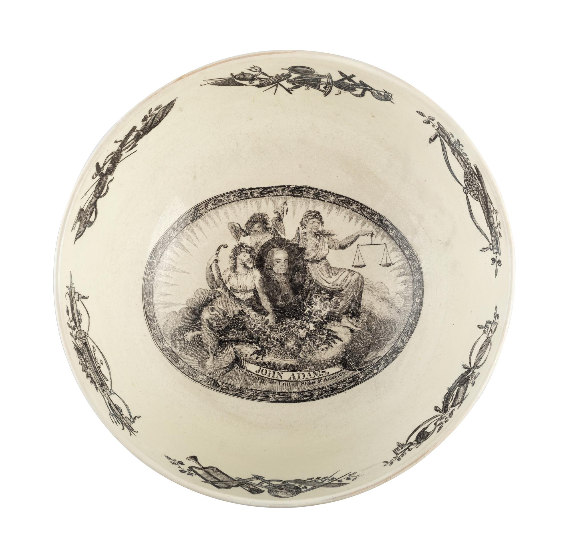 [ADAMS, John (1735-1826)]. Liverpool creamware punch bowl featuring portraits of John Adams as President, Benjamin Franklin, and George Washington. Late 18th/early 19th century.