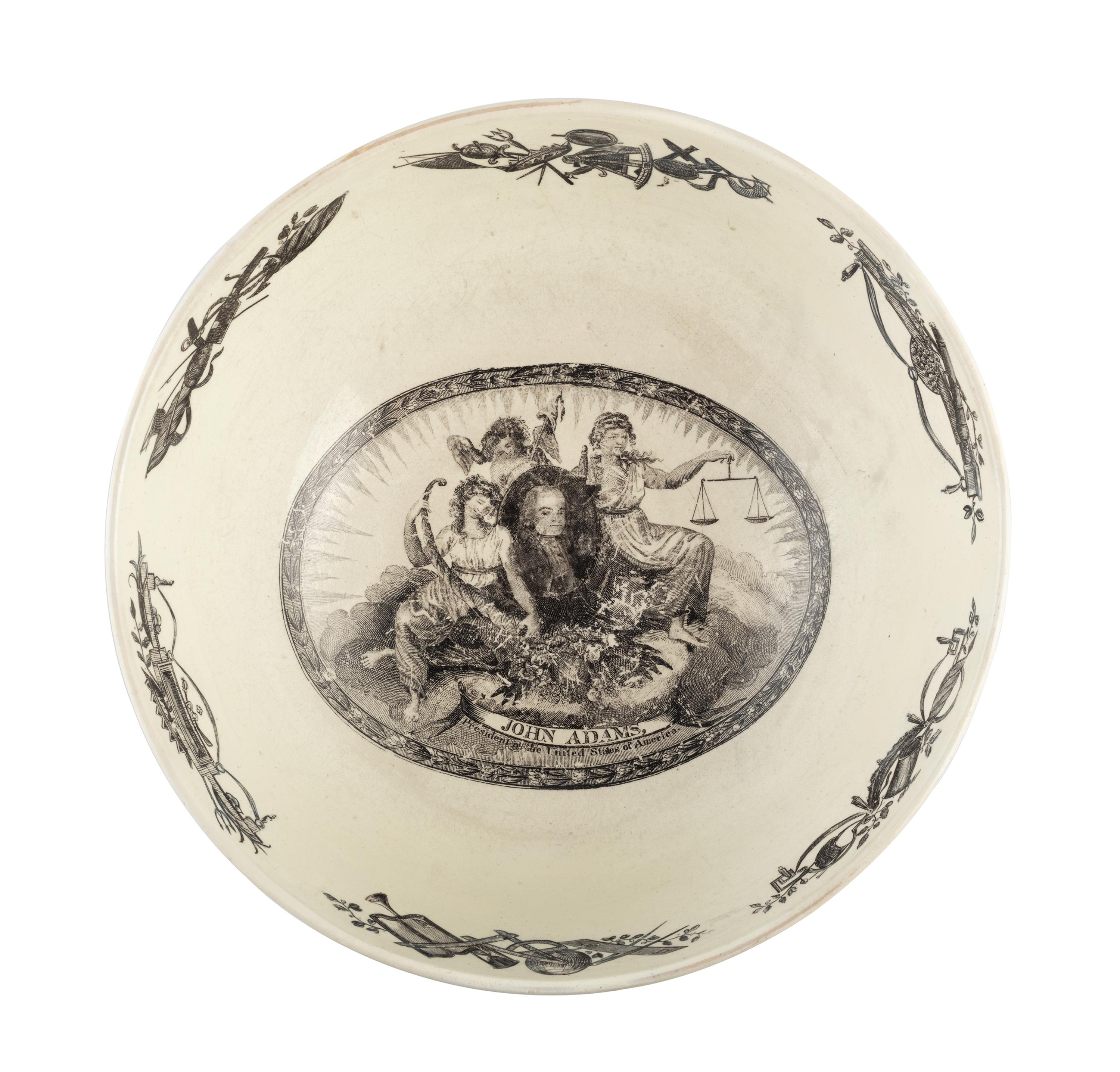 [ADAMS, John (1735-1826)]. Liverpool creamware punch bowl featuring portraits of John Adams as President, Benjamin Franklin, and George Washington. Late 18th/early 19th century.