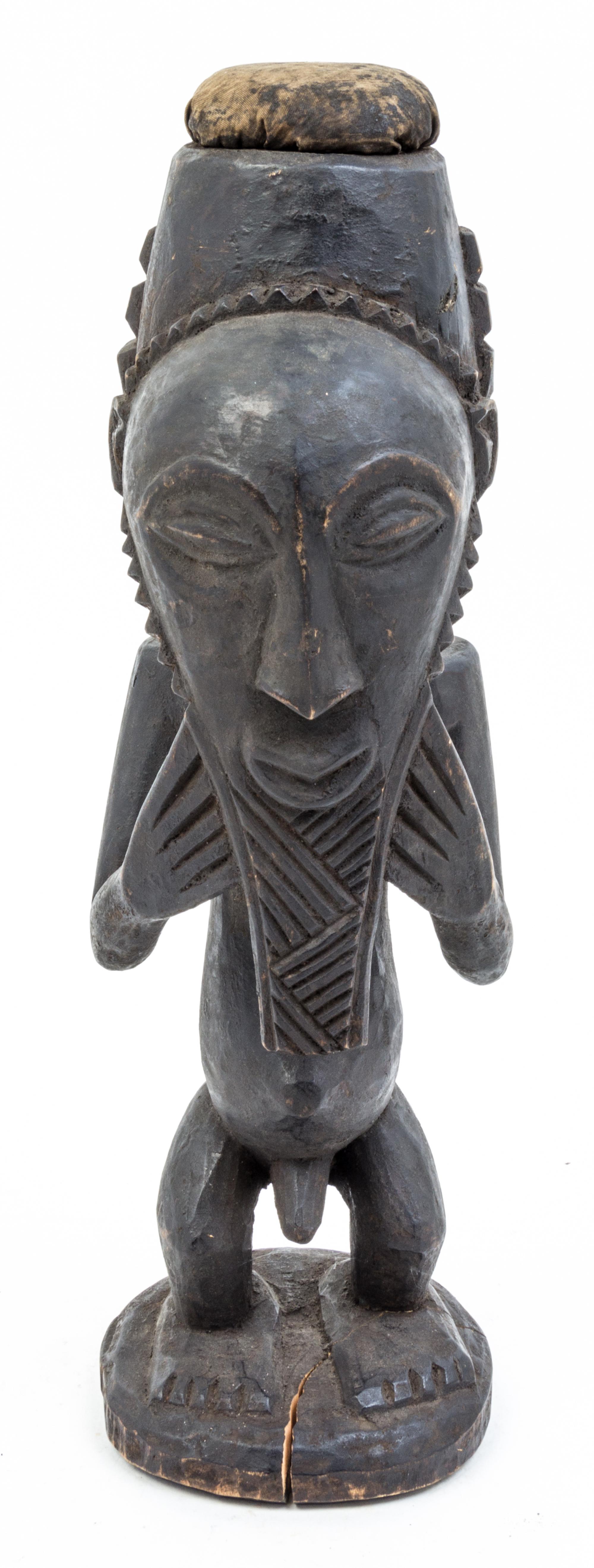 A Group of Three Wood Figures Height of tallest 30 1/2 inches.