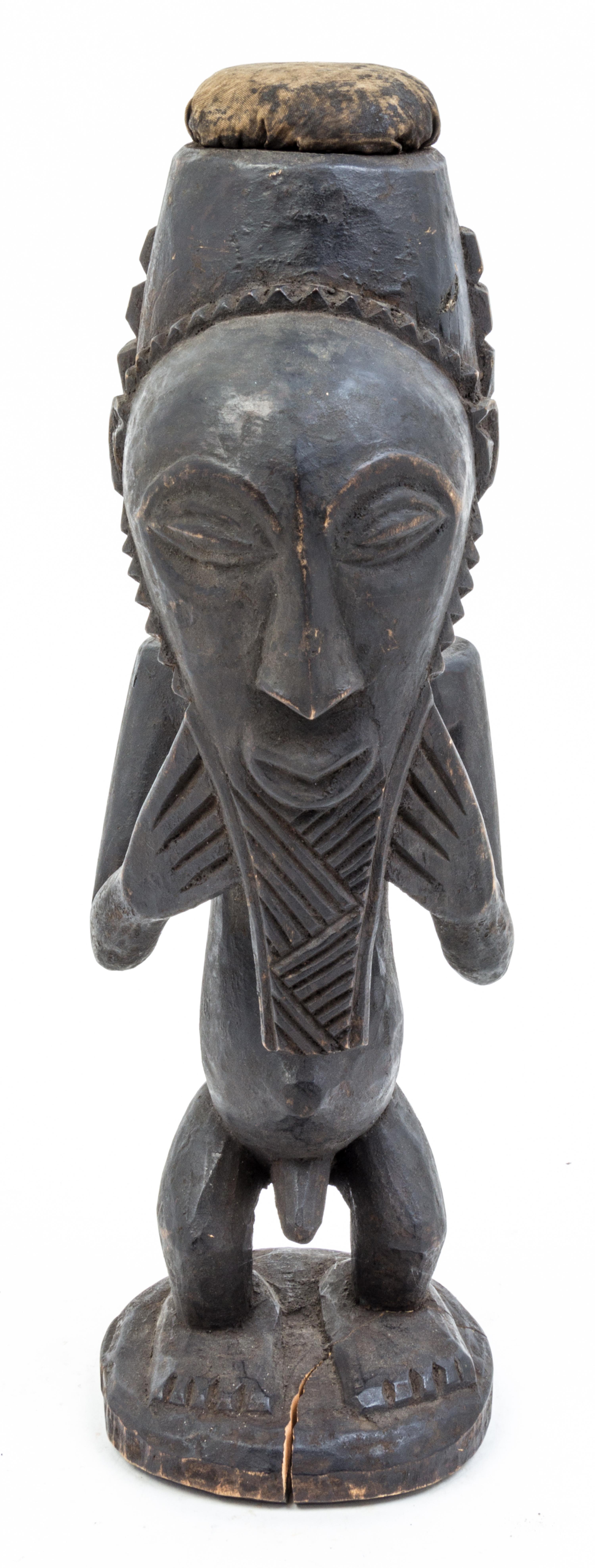 A Group of Three Wood Figures Height of tallest 30 1/2 inches.