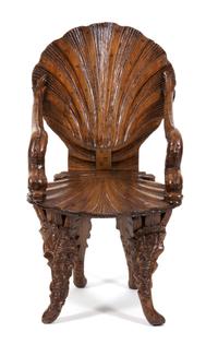 A Venetian Carved Walnut Grotto Armchair Height 33 1/4 inches. — LATE 19TH CENTURY