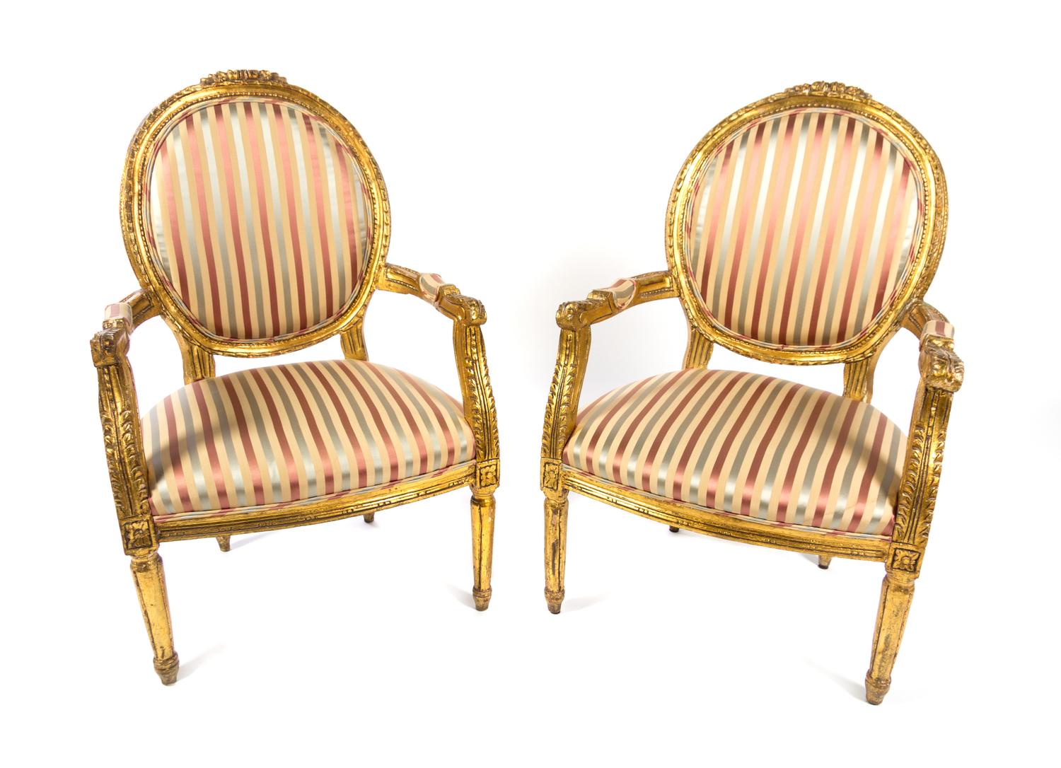 A Pair of Louis XVI Style Giltwood Fauteuils Height 39 inches. — 19TH CENTURY