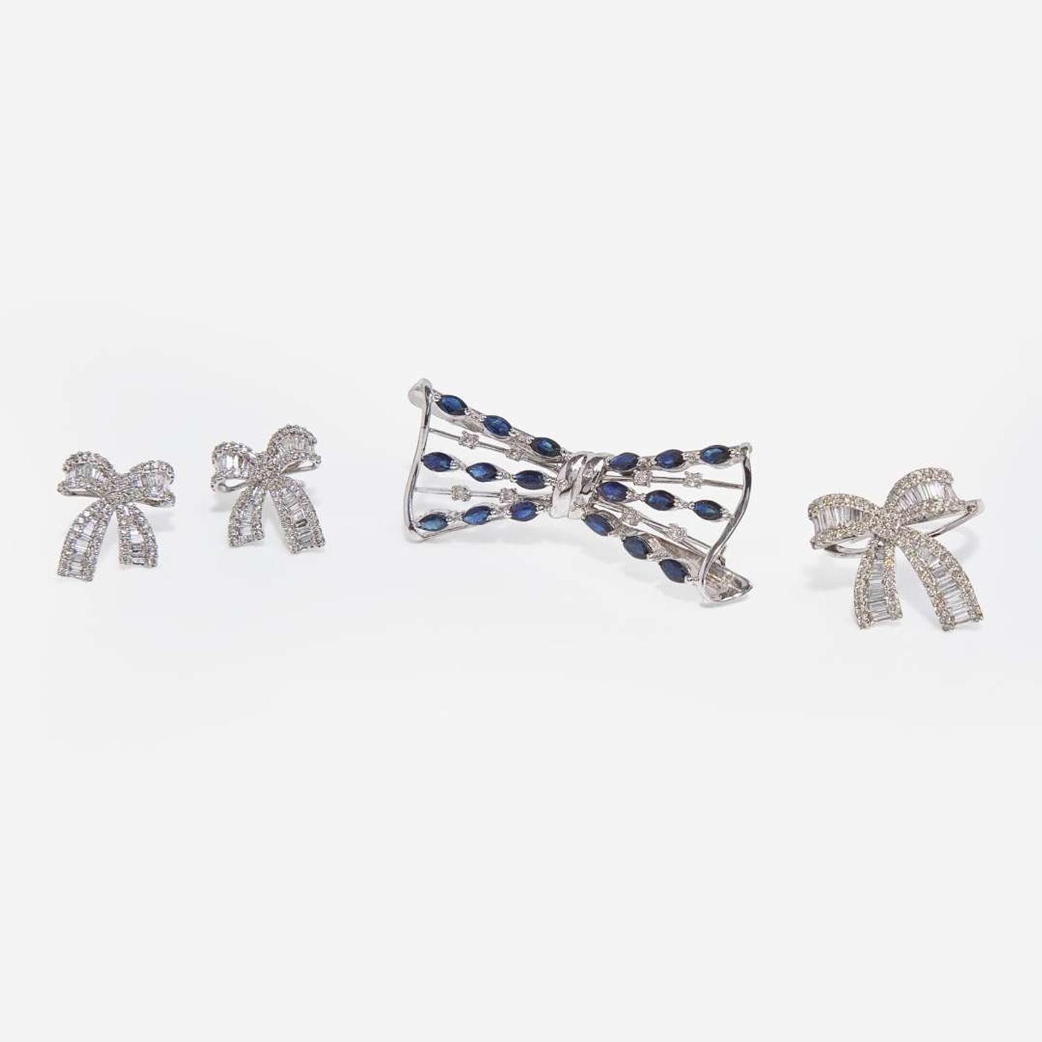 A Collection of 14K White Gold, Diamond, and Sapphire Jewelry