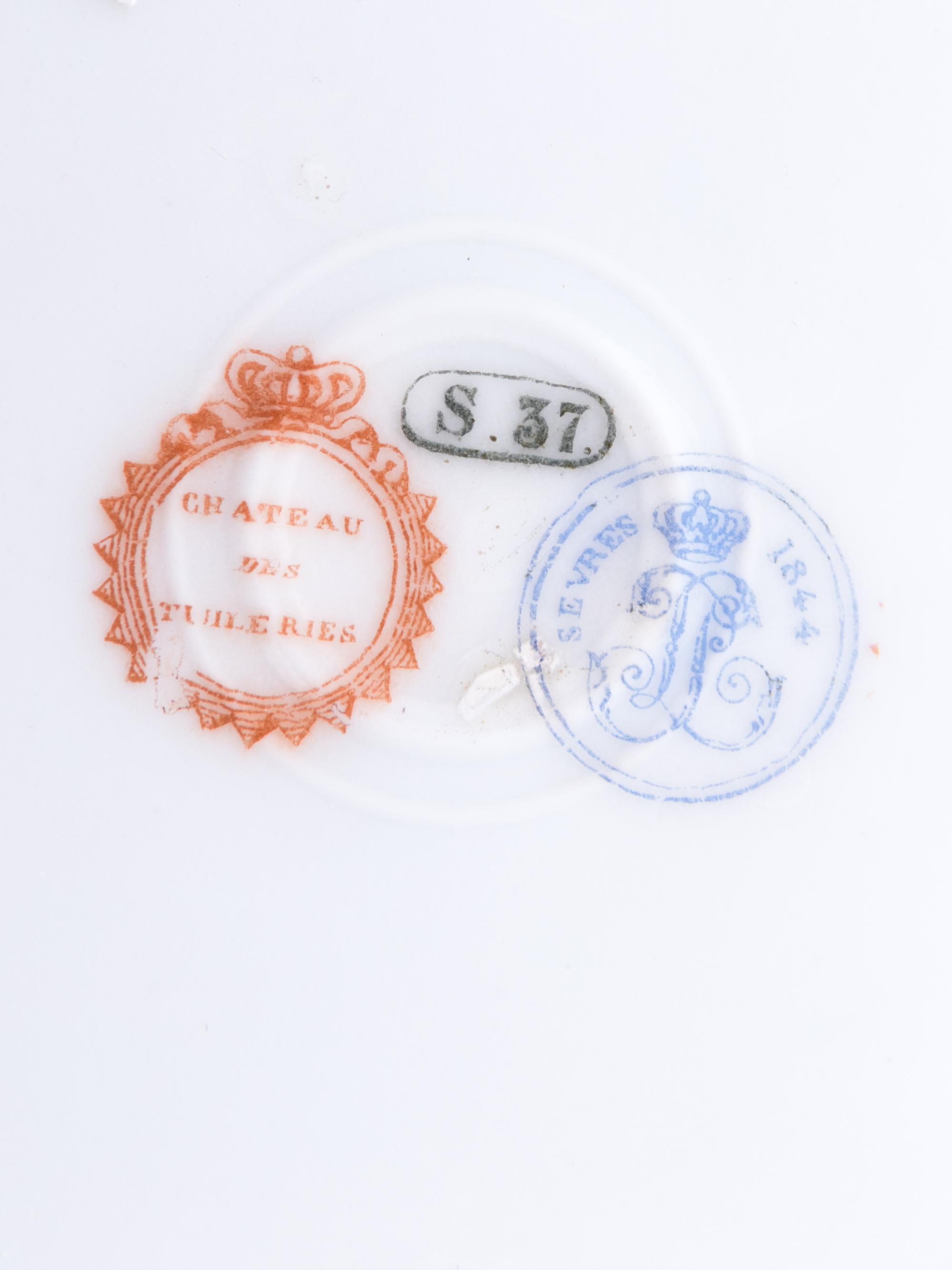 Two Sèvres Style Painted and Parcel Gilt Porcelain Plates
