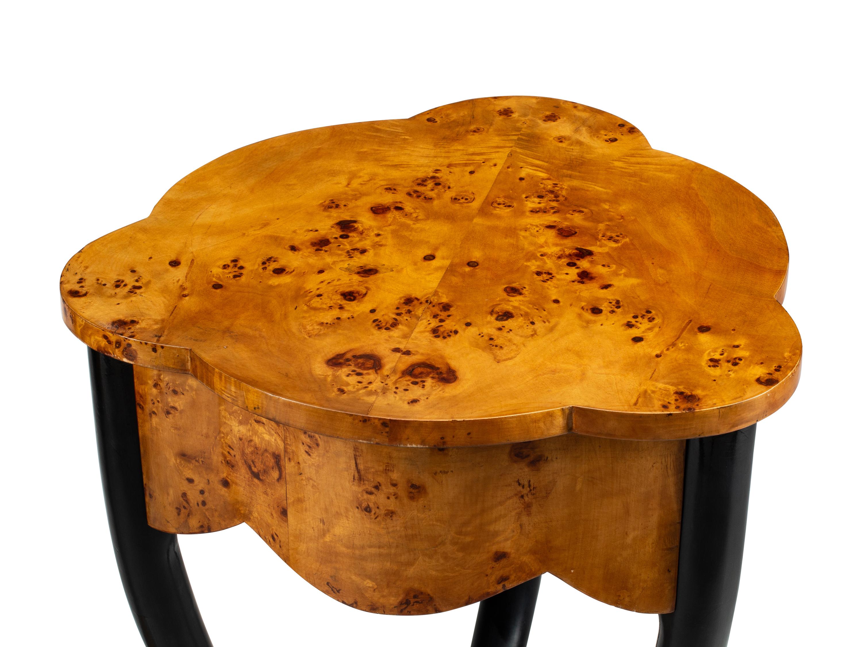 A Pair of Biedermeier Style Parcel Ebonized Triangular Side Tables