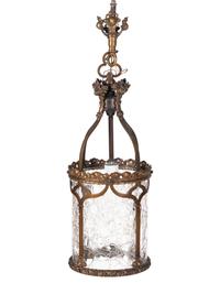 A Set of Four Gothic Style Brass Hall Lanterns