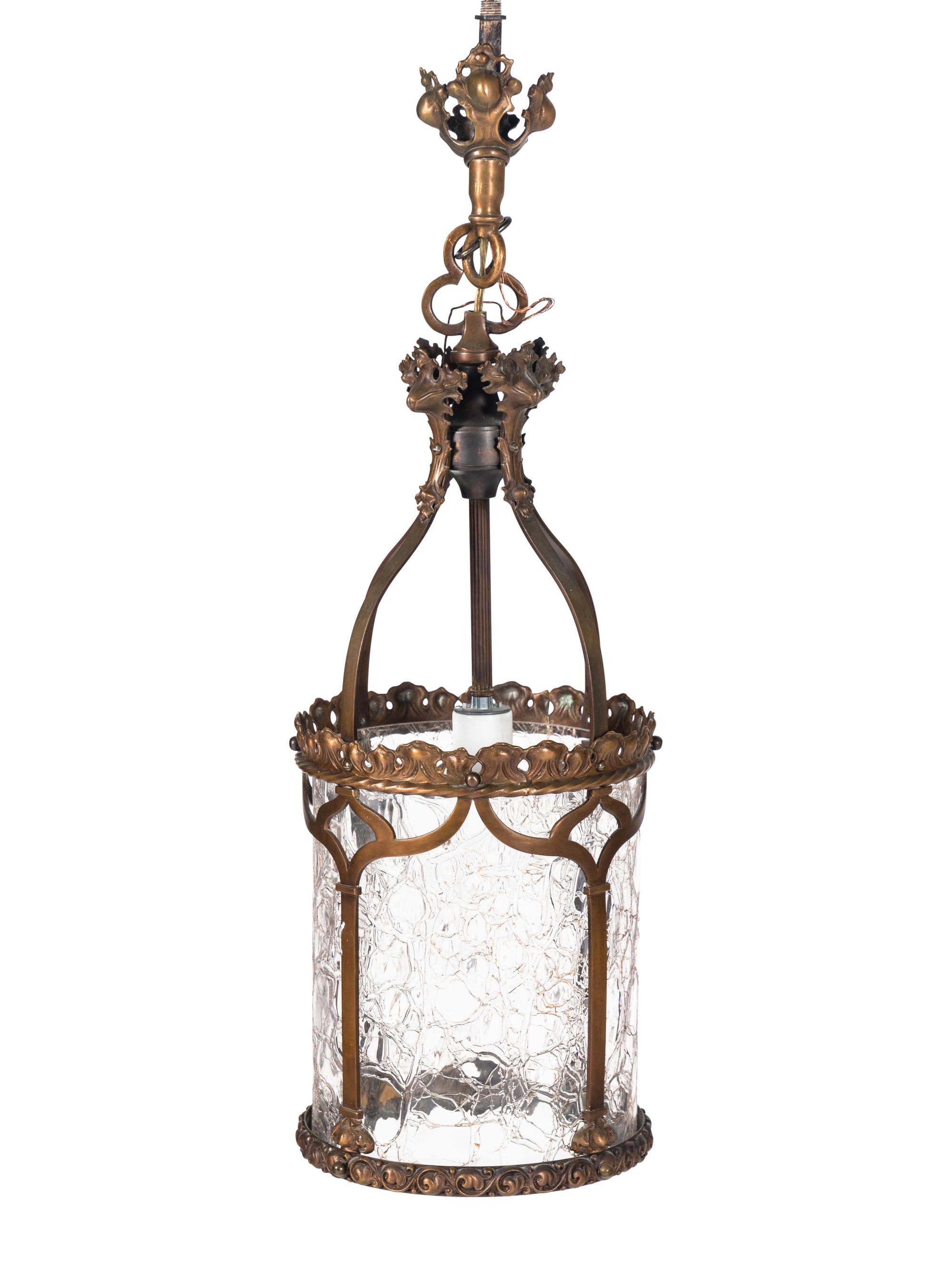A Set of Four Gothic Style Brass Hall Lanterns