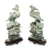 A Pair of Chinese Carved Jadeite Figures of Phoenixes