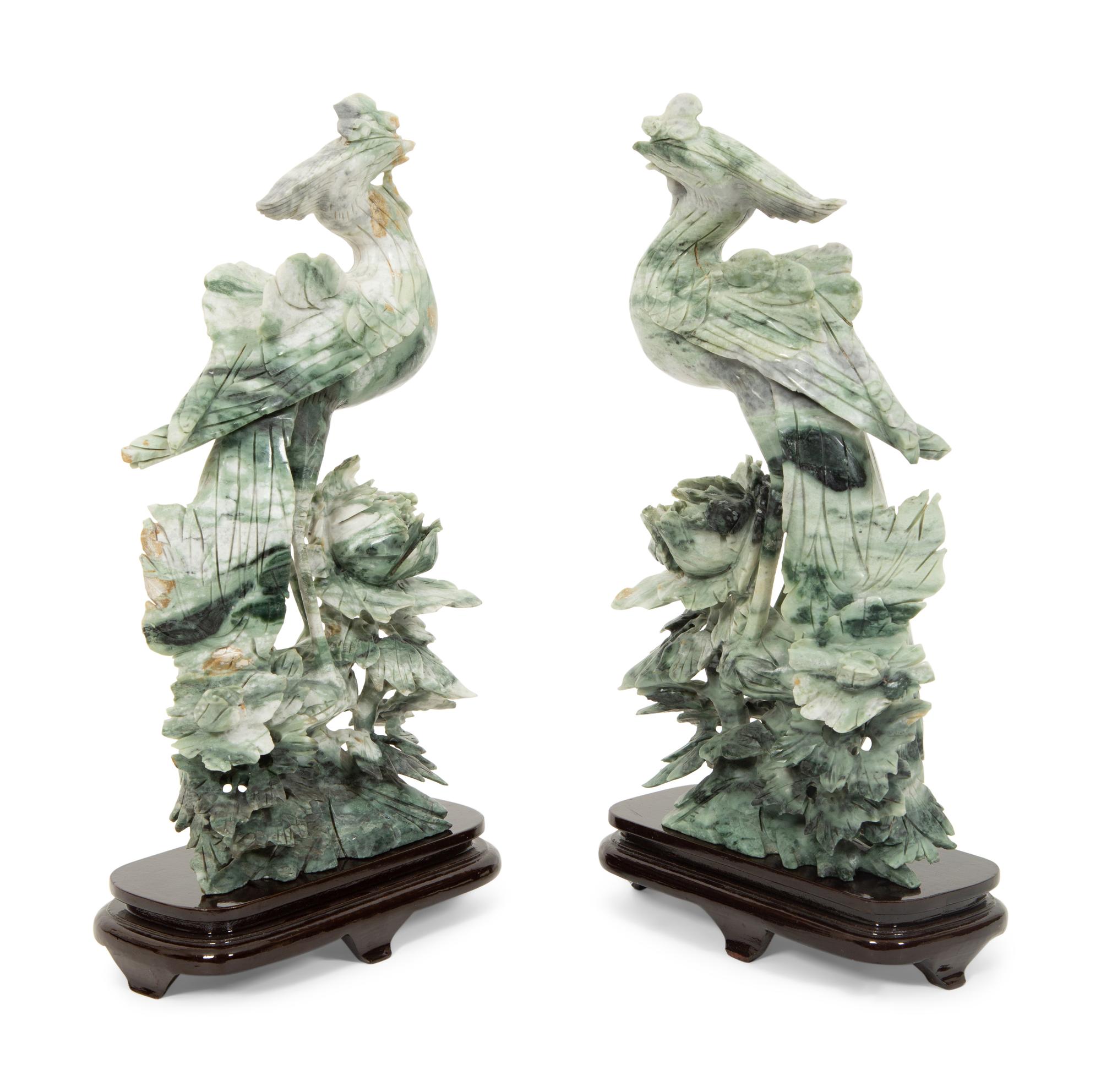 A Pair of Chinese Carved Jadeite Figures of Phoenixes