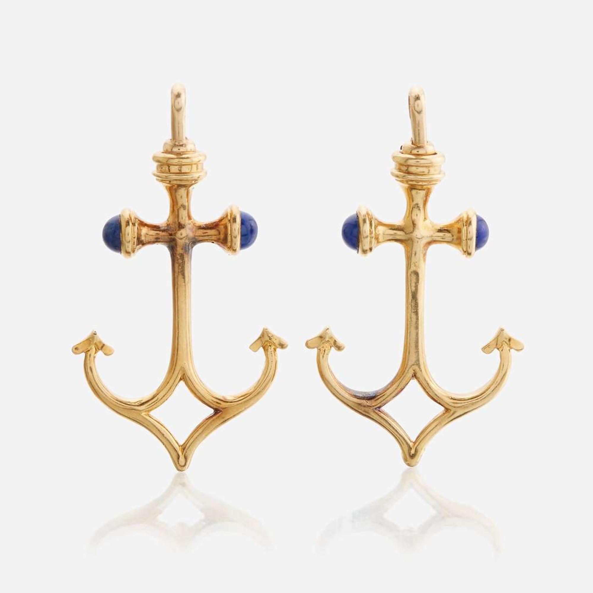 A pair of eighteen karat gold and lapis lazuli pendant/brooches