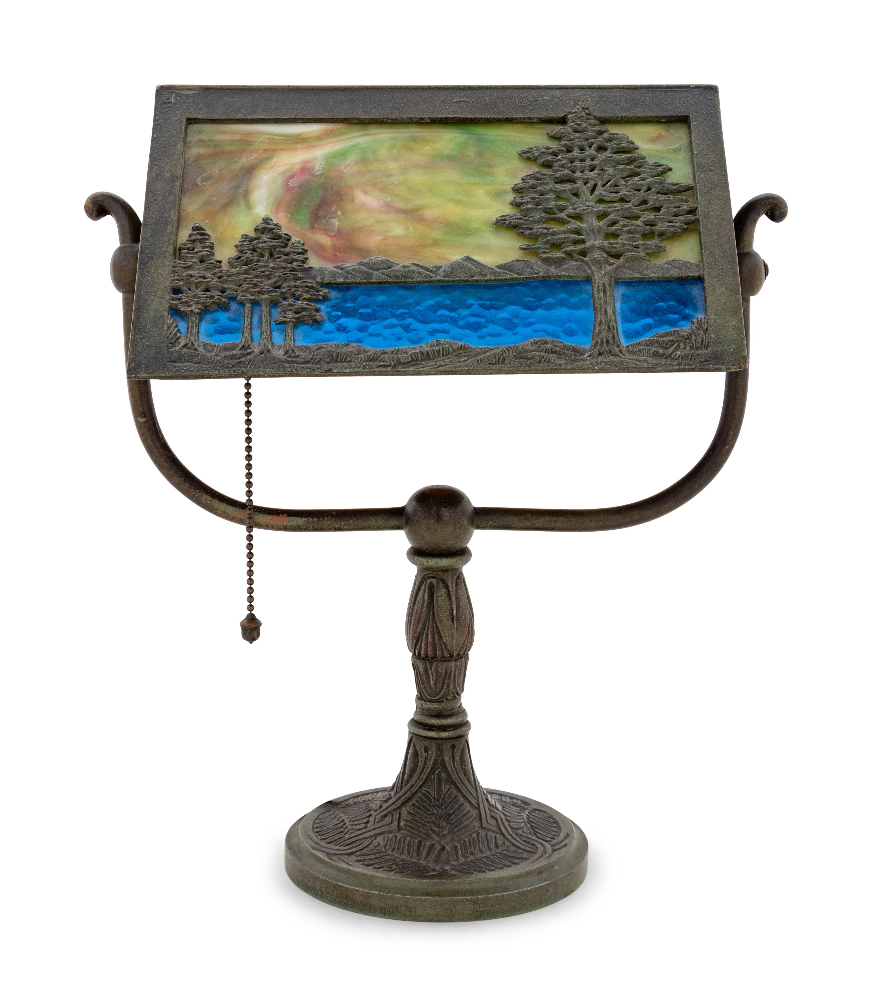 A Bradley & Hubbard Bronze and Slag Glass Lamp