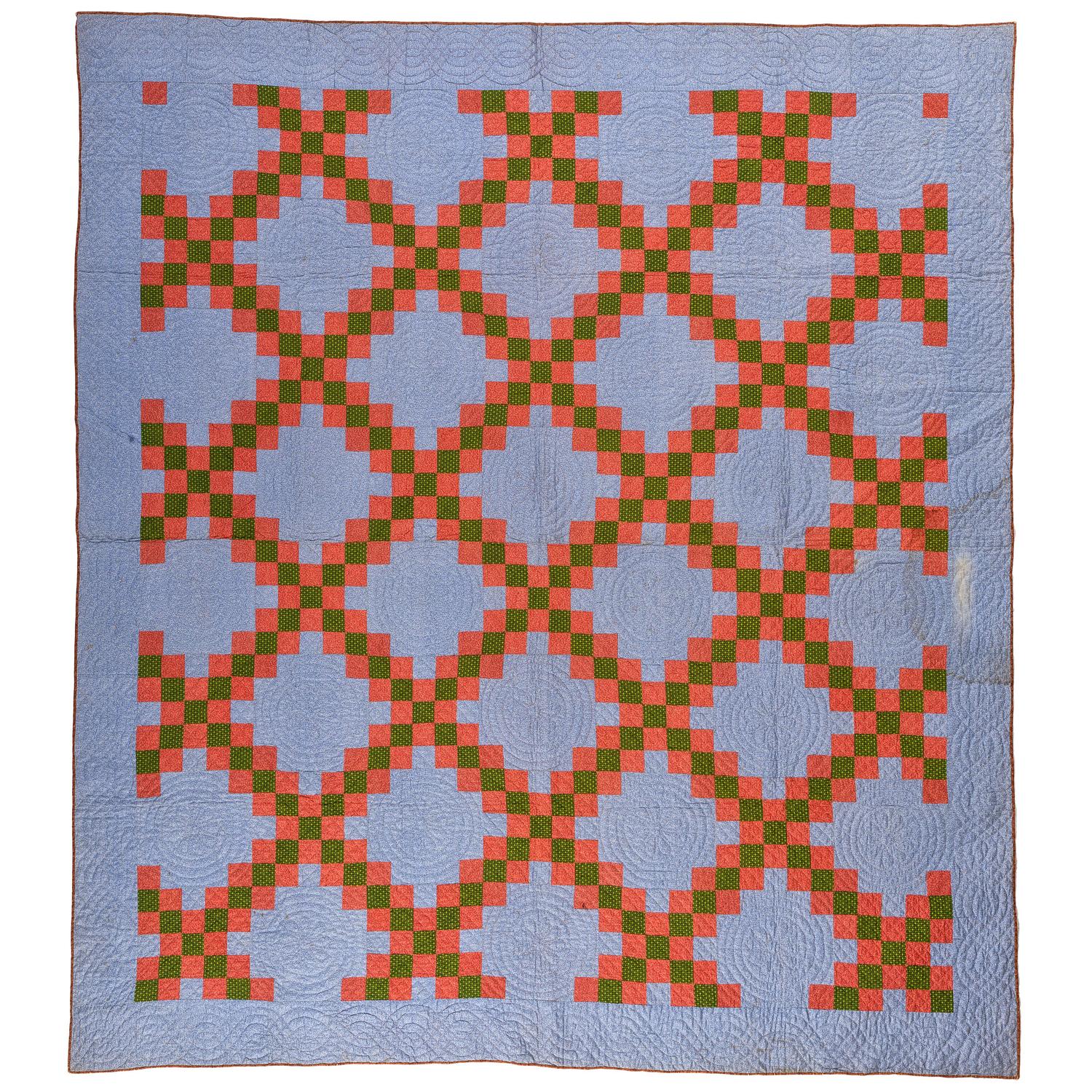 A Double Irish Chain Quilt with a Blue Ground
