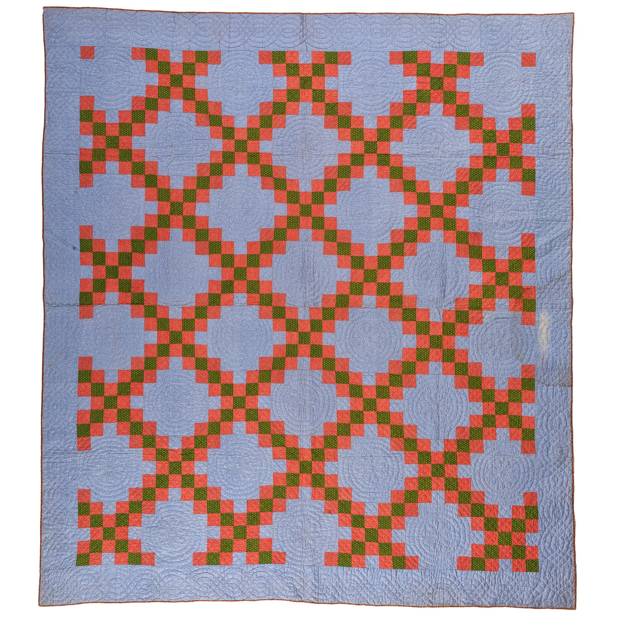 A Double Irish Chain Quilt with a Blue Ground