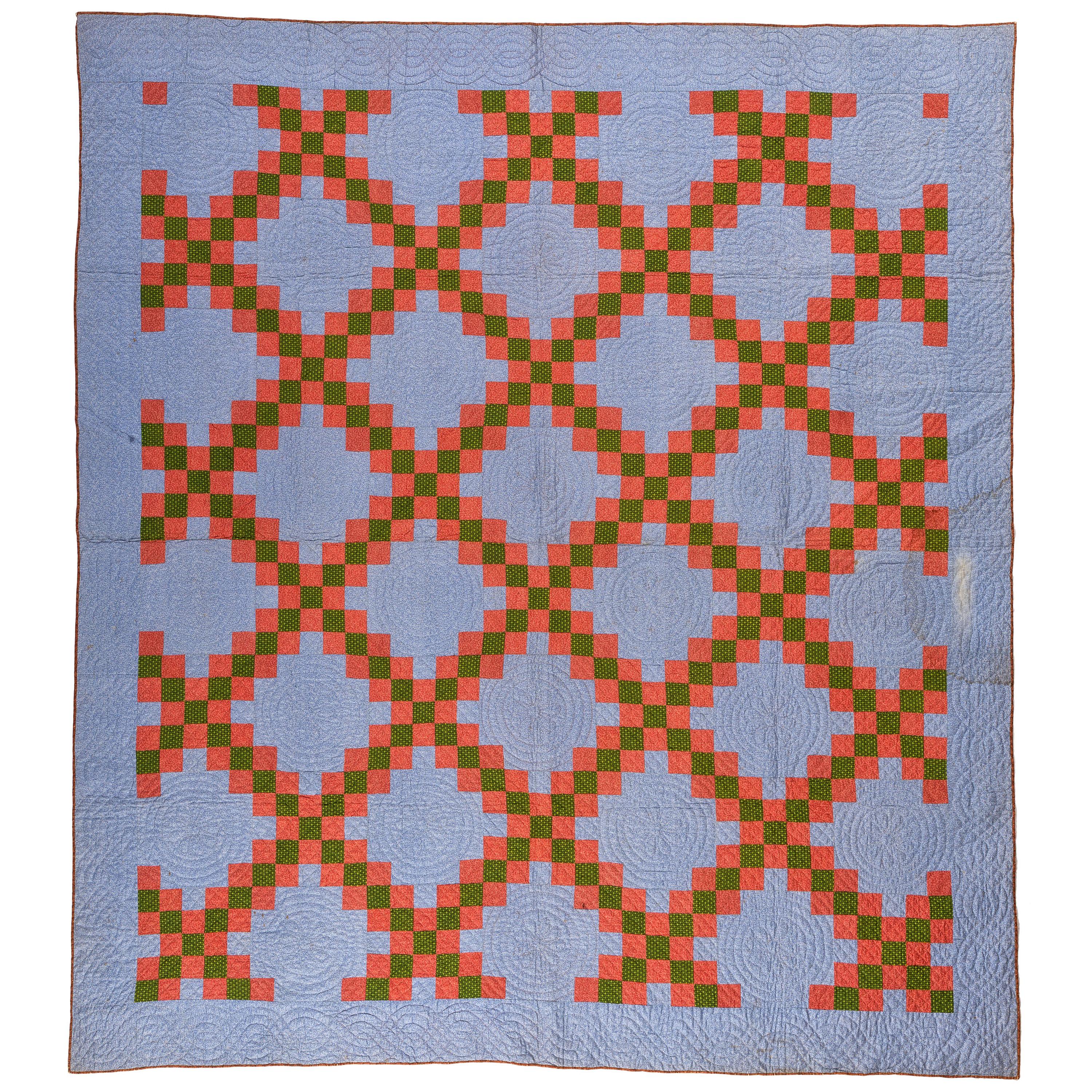 A Double Irish Chain Quilt with a Blue Ground
