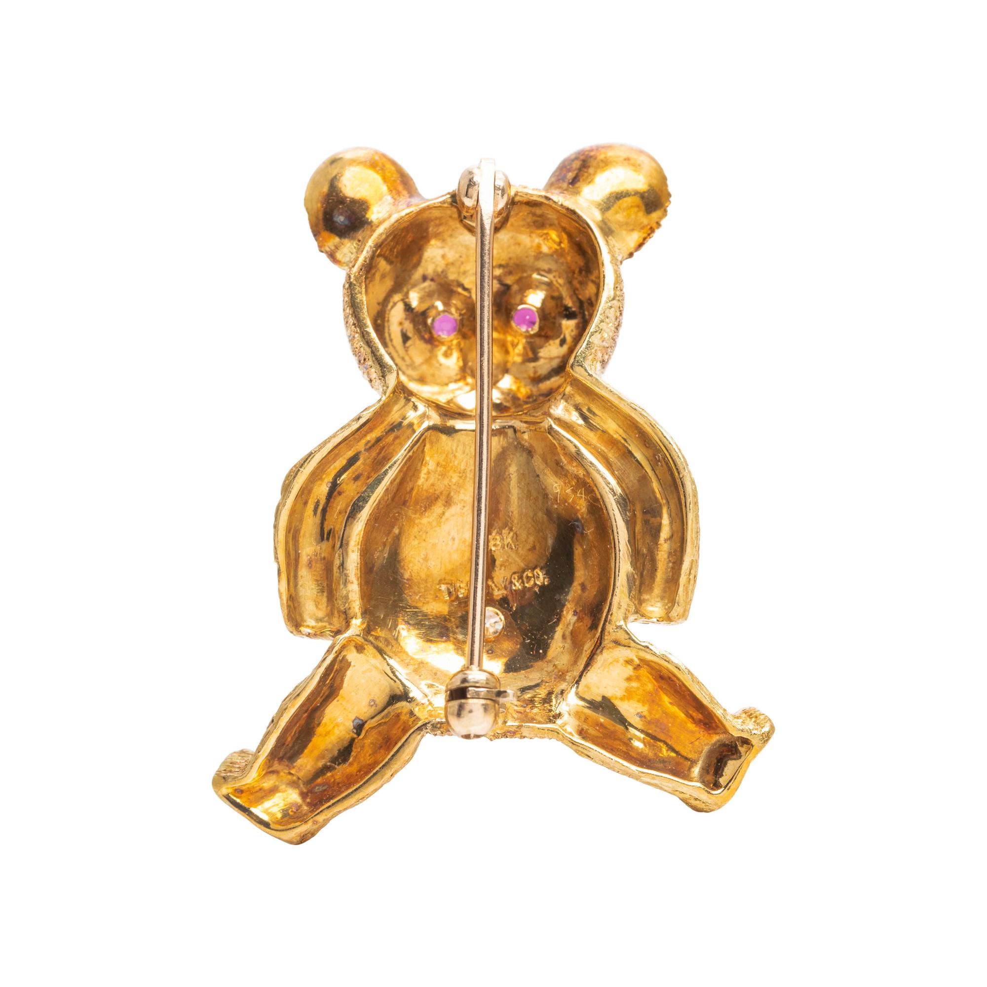 TIFFANY & CO., YELLOW GOLD, DIAMOND AND RUBY TEDDY BEAR BROOCH