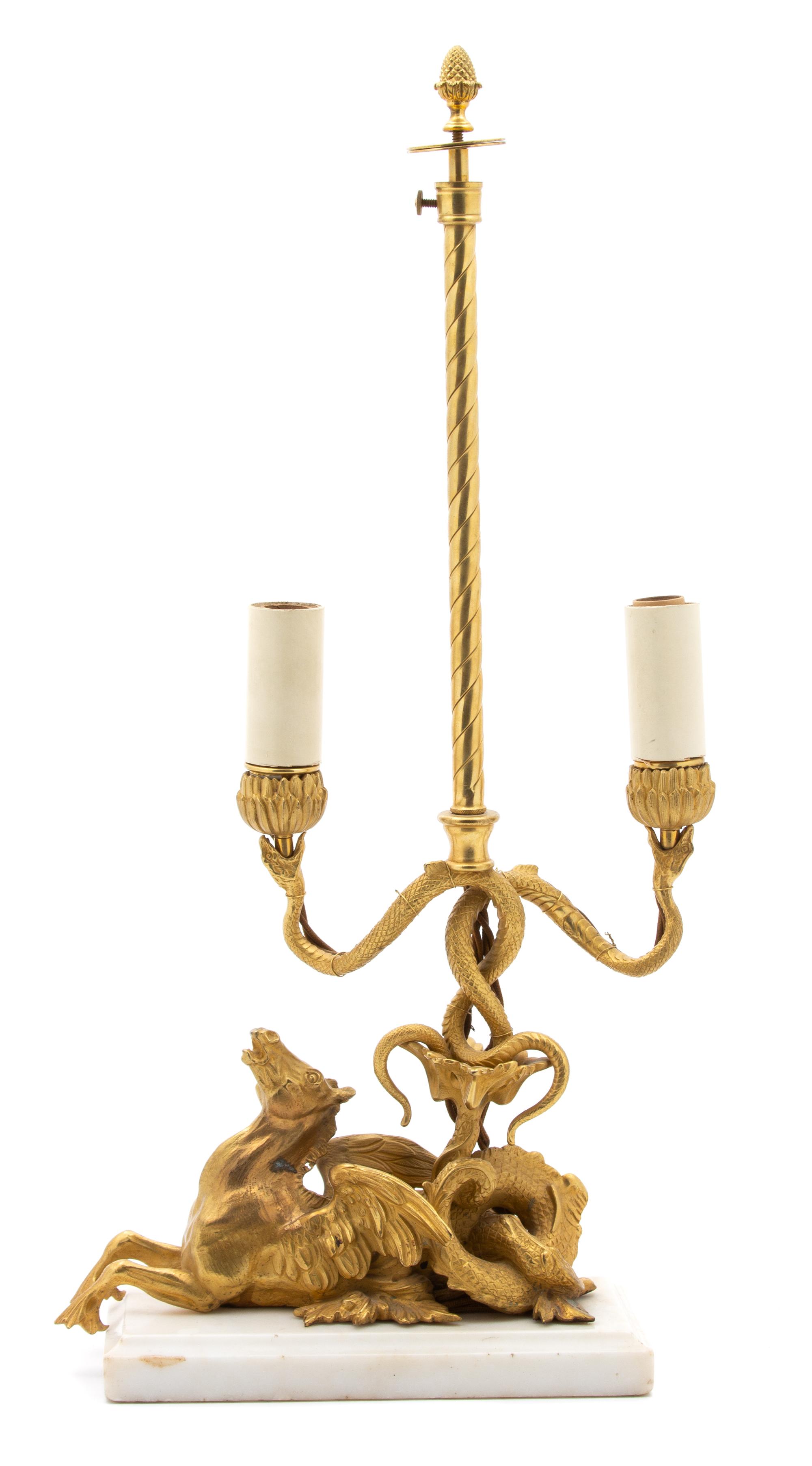 A French Gilt Bronze Sculpture of a Hippocamp Two-Light Candelabrum Height of candelabrum 9 1/2 inches. — 19TH CENTURY