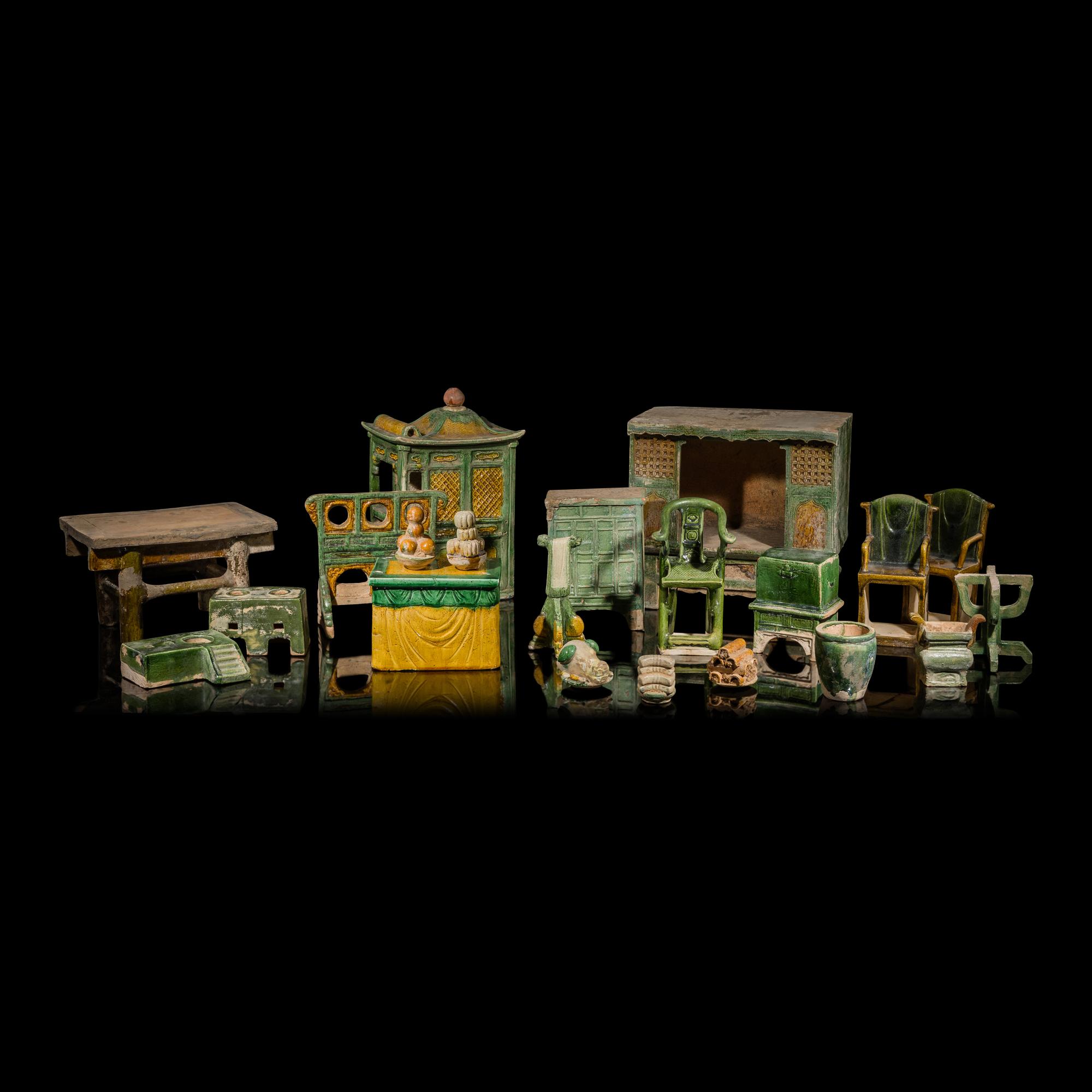 A Collection of Chinese Sancai Glazed Pottery Models of Furniture, Ming Dynasty — 明 三彩交椅、供桌、床等一組二十一件