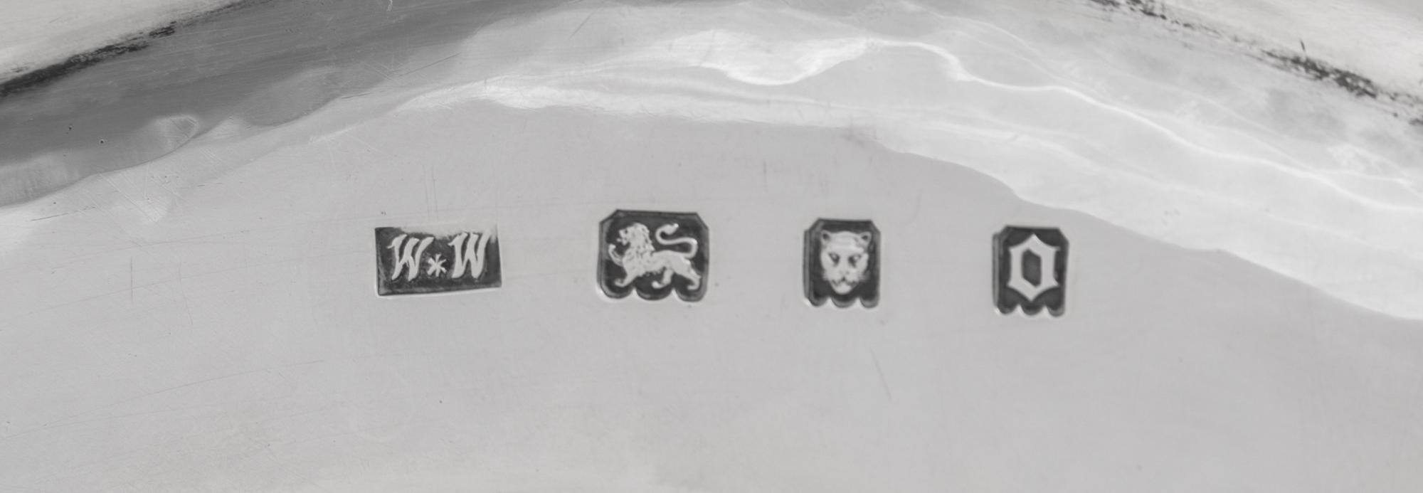 A Set of Twelve English Silver Plates