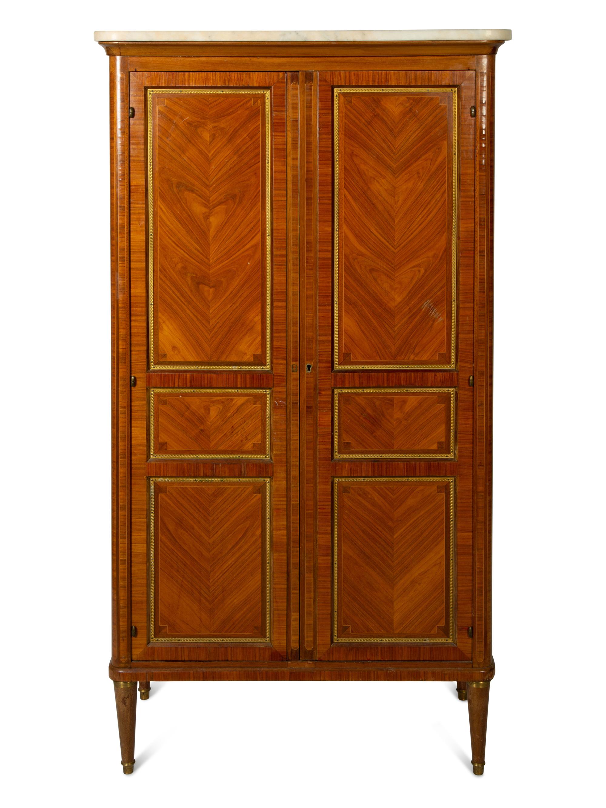 A Louis XVI Style Gilt Bronze Mounted Tulipwood Marble-Top Cabinet