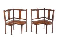 A Pair of George III Provincial Mahogany Corner Seats