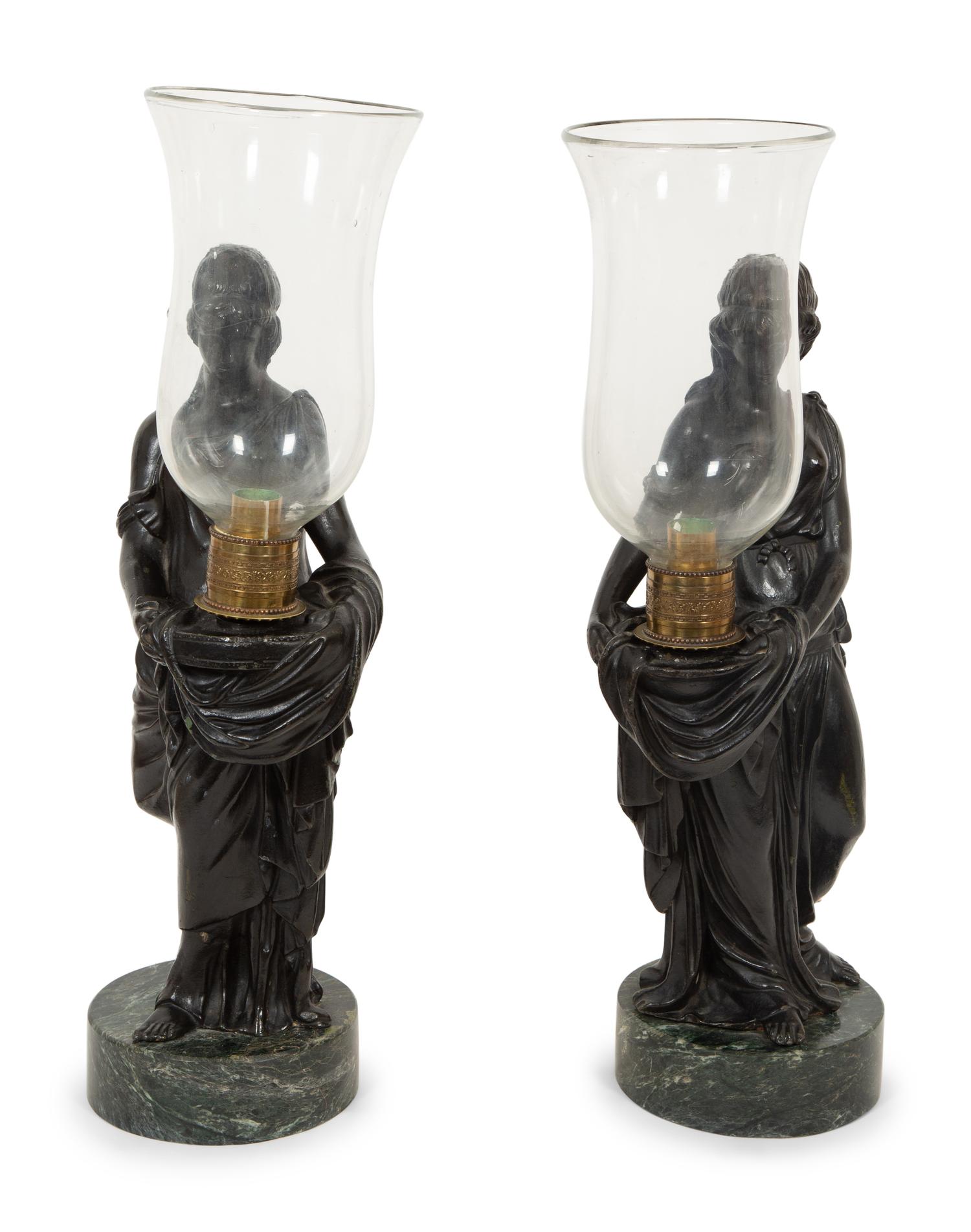 A Pair of Figural Hurricane Candlesticks on Verde Antico Marble Bases