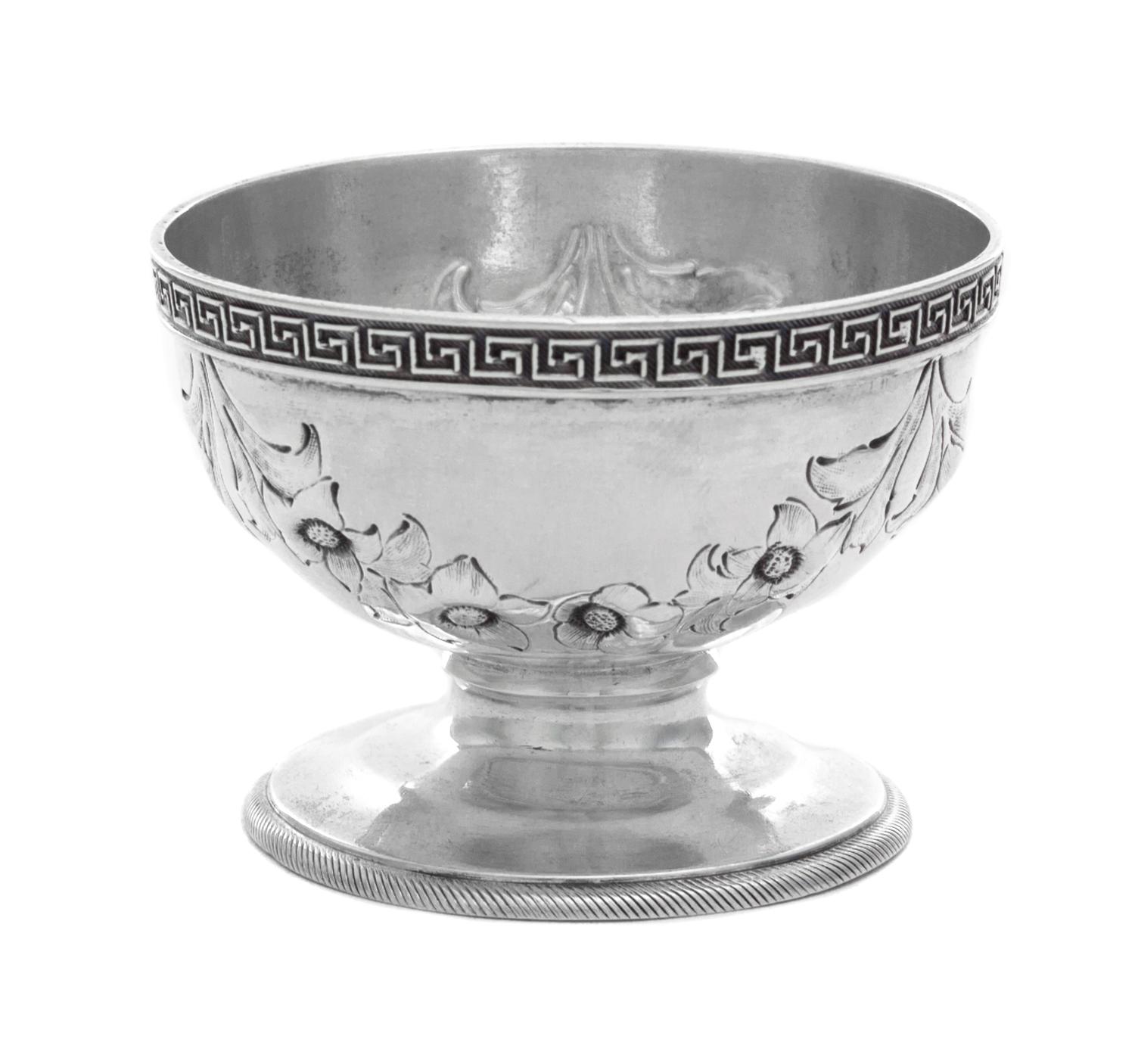An American Coin Silver Salt, Gorham Mfg. Co., Providence, RI, 1855, having a Greek key decorated rim, the body worked with floral swag