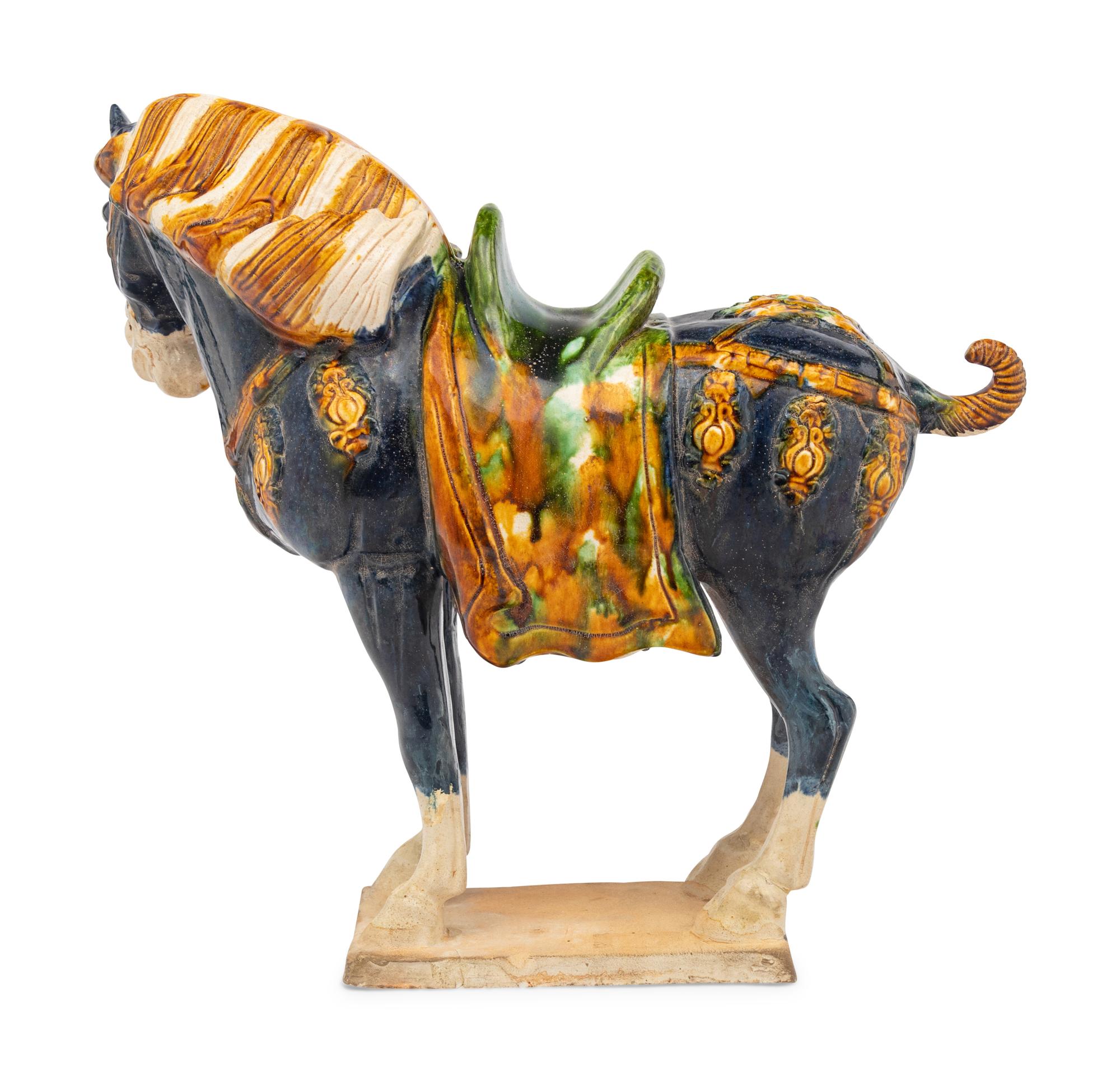 A Chinese Sancai Glazed Terracotta Model of a Horse