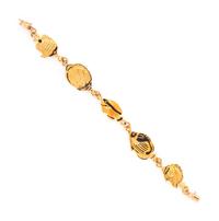 GAYLE BRIGHT, YELLOW GOLD AND ENAMEL FISH BRACELET