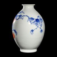 A Japanese Red, Blue, and White 'Persimmon' Porcelain Vase by Makuzu Kozan (1842-1916) 宮川香山製青花柿紋賞瓶