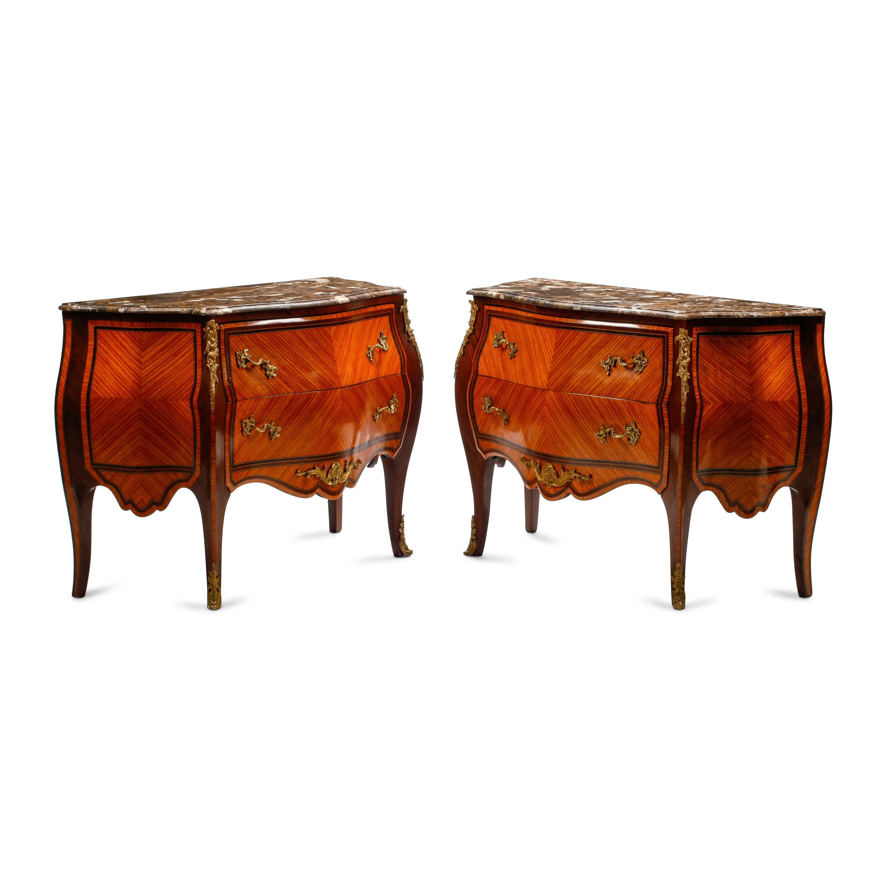 A Pair of Louis XV Style Bookmatch Veneered and Gilt Bronze Mounted Marble-Top Commodes