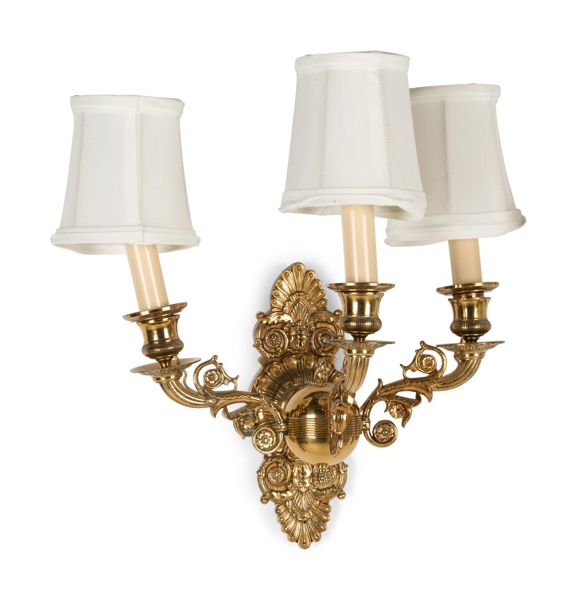 A Pair of Empire Style Brass Three-Light Sconces