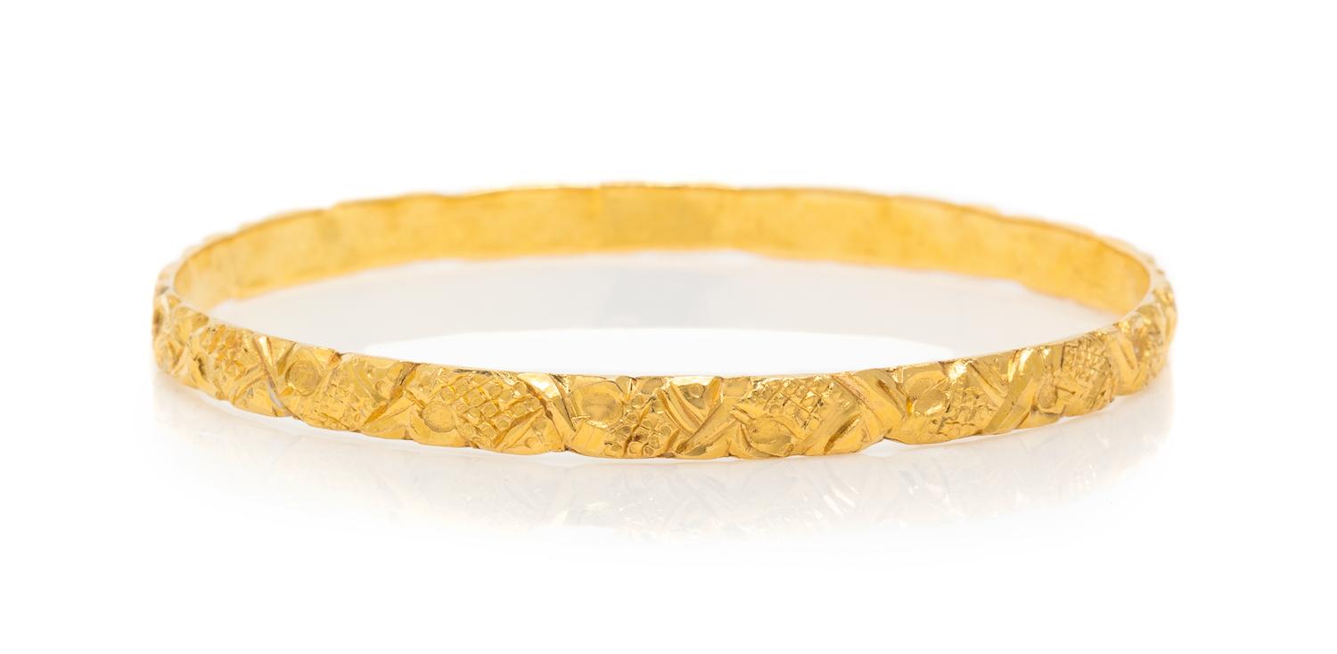 A High Karat Yellow Gold Bangle Bracelet, 12.55 dwts.
