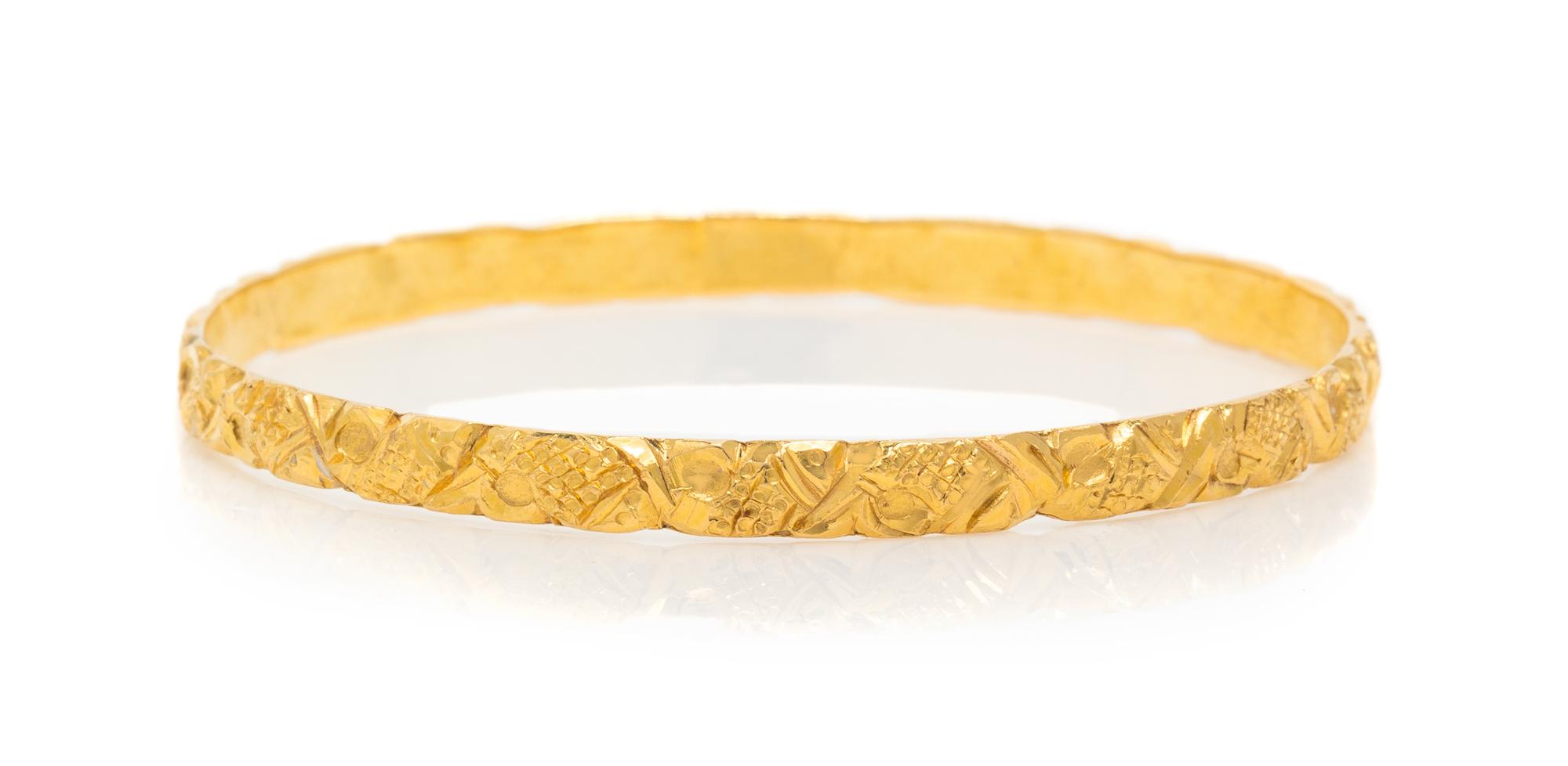 A High Karat Yellow Gold Bangle Bracelet, 12.55 dwts.