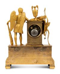An Empire Gilt Bronze Figural Mantel Clock