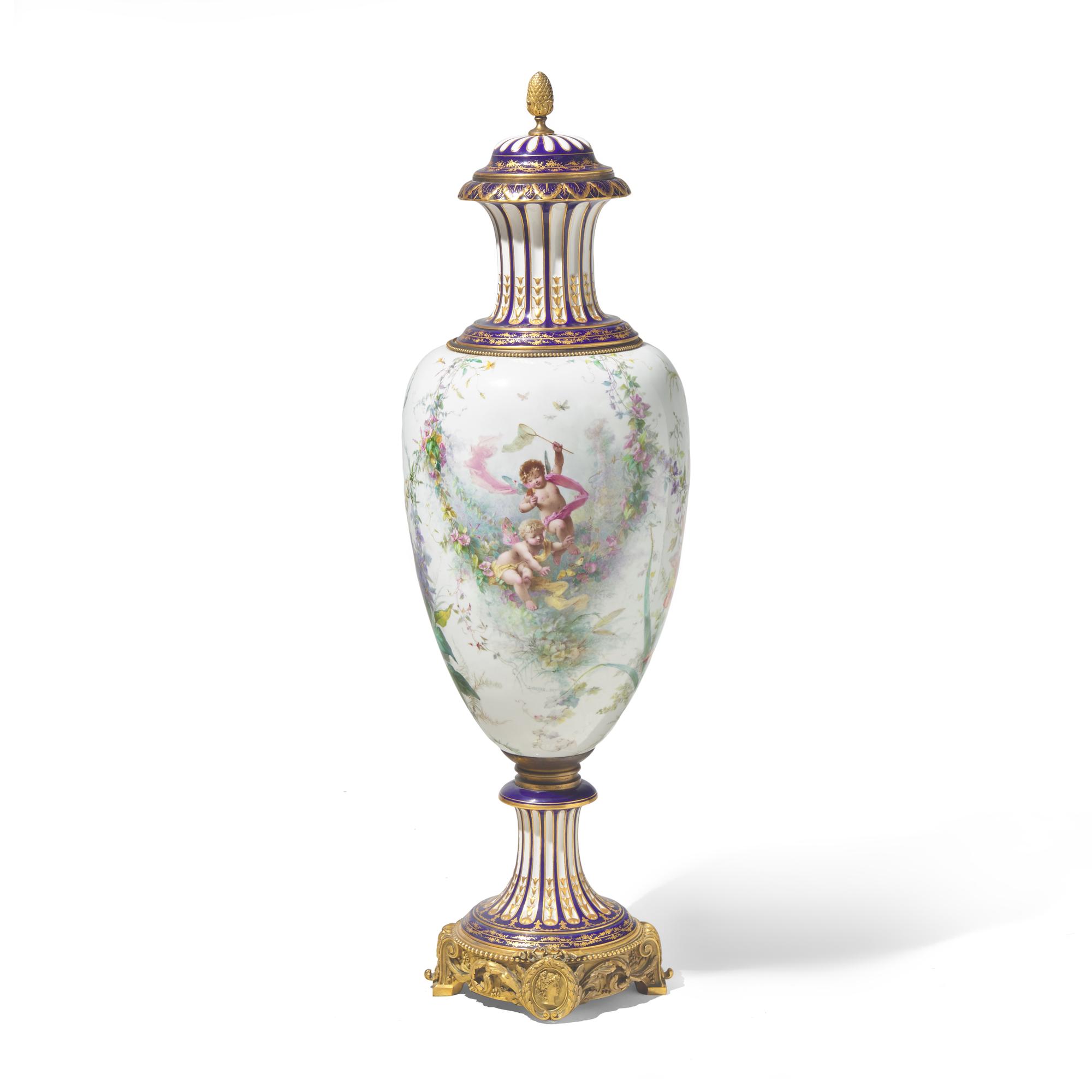 A Large Sévres White-Ground Porcelain and Gilt Bronze Mounted Urn
