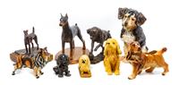 A Group of Nine Dog Figures of Various Breed Height of tallest 13 1/2 inches.