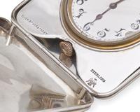 A Sterling Silver Travel Clock with Monogram for John Jacob Astor IV (1864-1912)