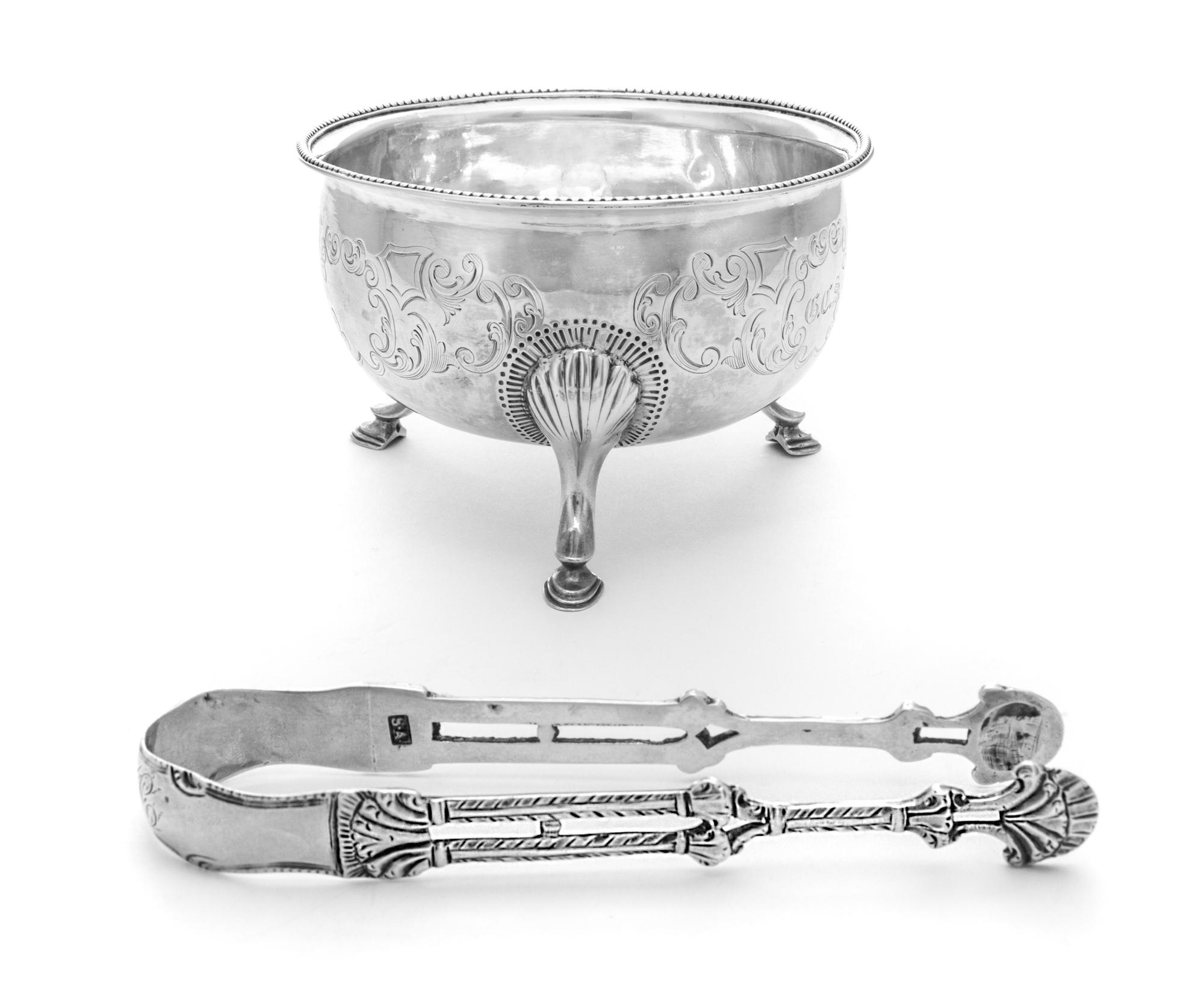 An Irish George III Silver Sugar Bowl, Matthew West, Dublin, Late 18th/Early 19th Century, having a beaded rim, the body chased with C-
