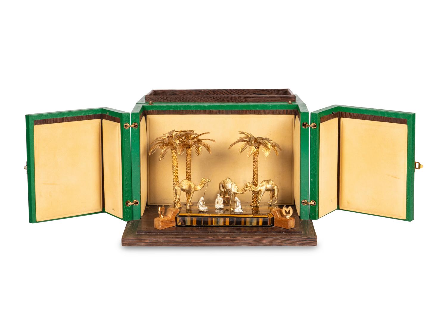 A Mouawad Silver-Gilt and Tiger's Eye Figural Group