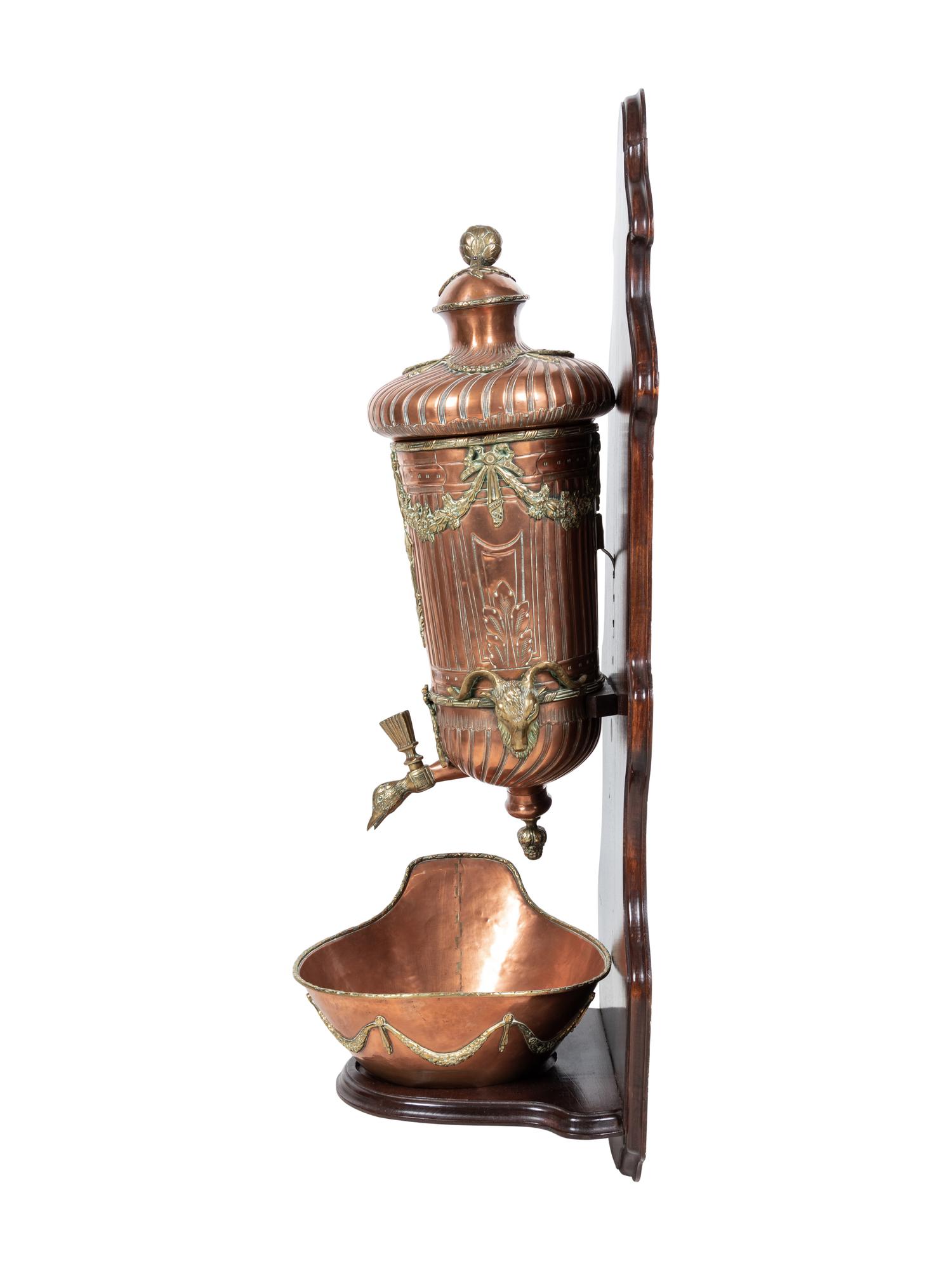 A French Copper and Brass Lavabo and Basin with an Oak Bracket