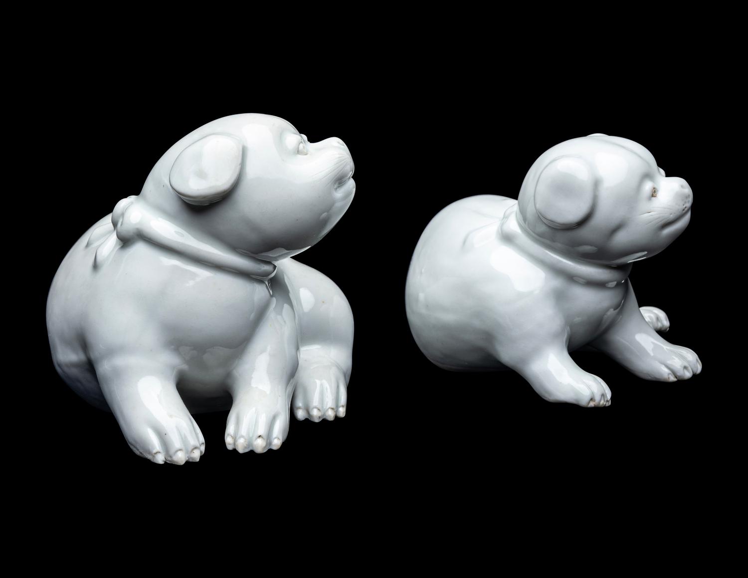 A Pair of Japanese Hirado White Glazed Porcelain Figures of Puppies
