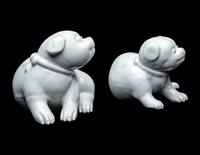 A Pair of Japanese Hirado White Glazed Porcelain Figures of Puppies