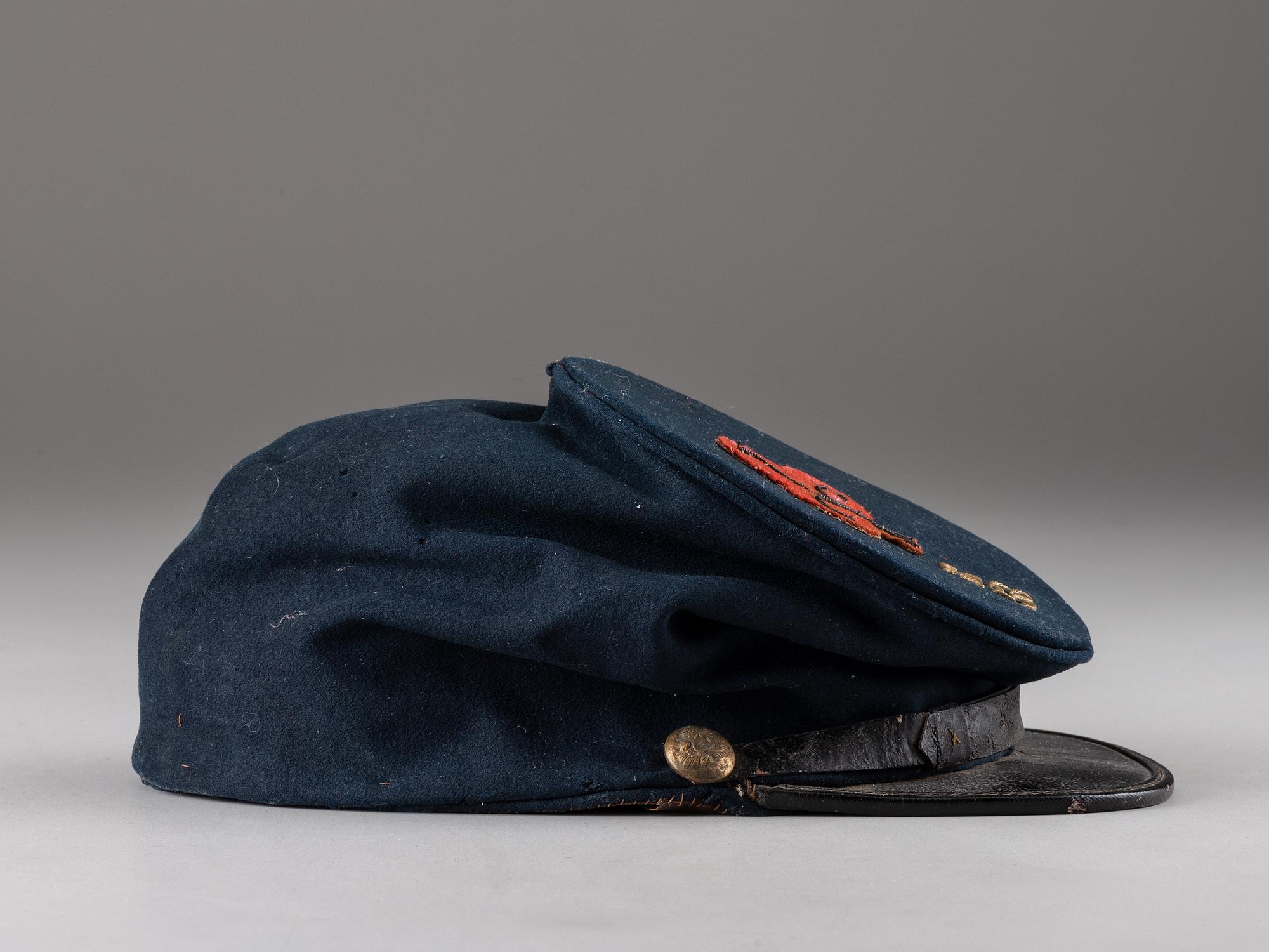 [CIVIL WAR]. 53rd Pennsylvania forage cap with insignia and II Corps, 1st Division badge.